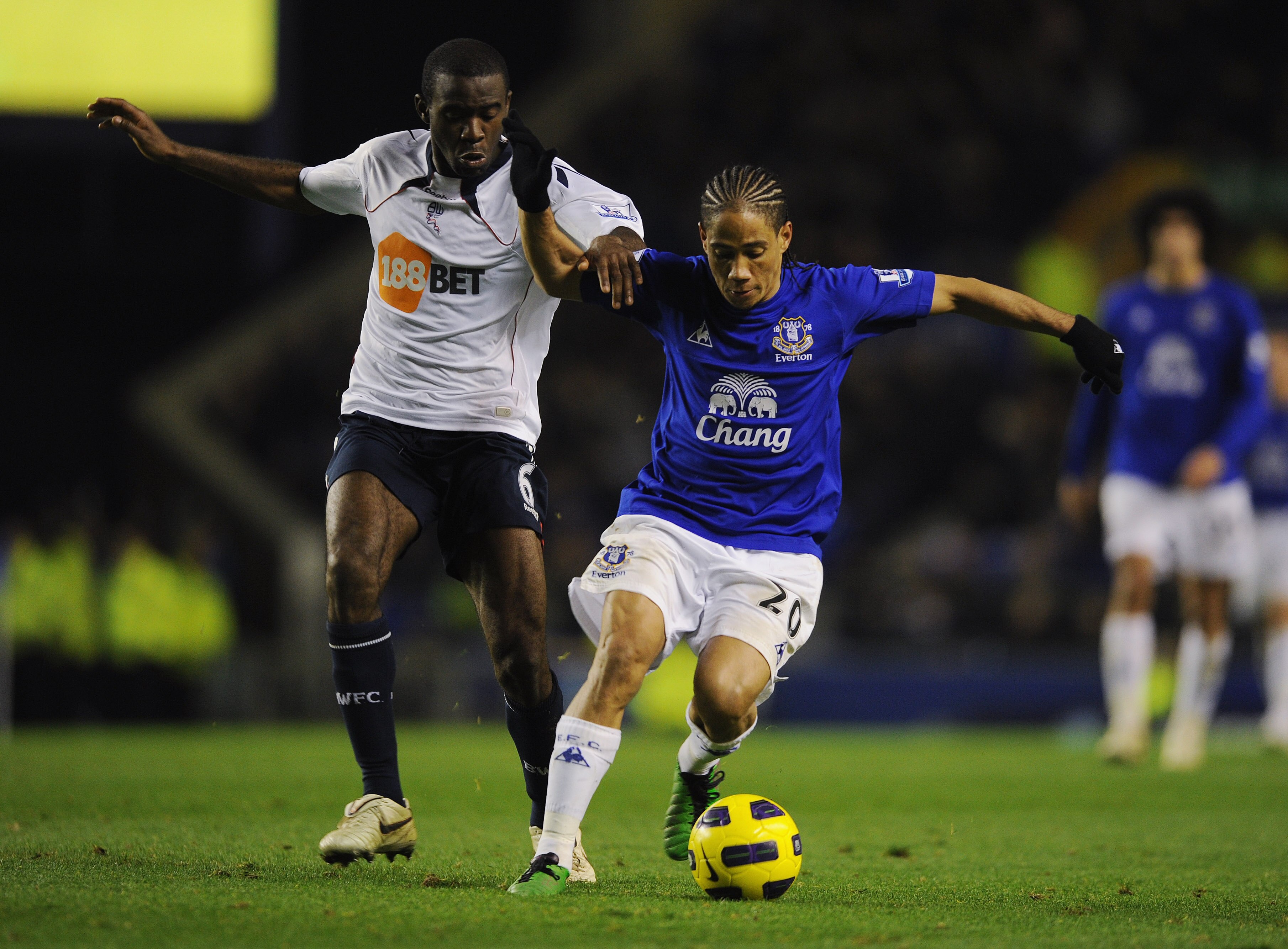 LIVERPOOL, ENGLAND - NOVEMBER 10: Fabrice Muamba of Bolton battles Steven Pienaar of Everton during the Barclays Premier League match between Everton and Bolton Wanderers at Goodison Park on November 10, 2010 in Liverpool, England.  (Photo by Michael Rega