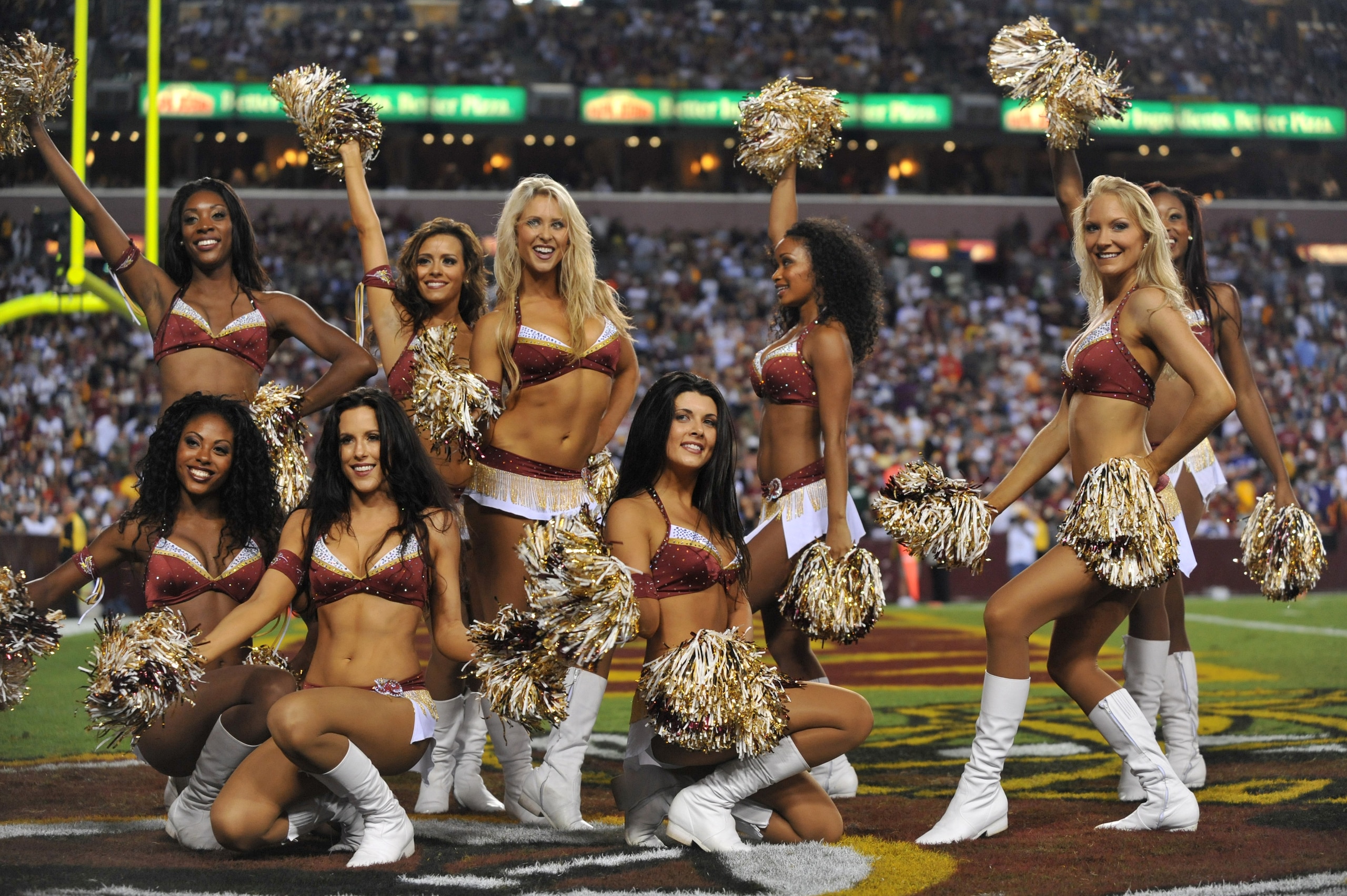LANDOVER - SEPTEMBER 12: Cheerleaders for the Washington Redskins pose after a routine during the NFL season opener against the Dallas Cowboys at FedExField on September 12, 2010 in Landover, Maryland. The Redskins defeated the Cowboys 13-7. (Photo by La LANDOVER - SEPTEMBER 12: Cheerleaders for the Washington Redskins pose after a routine during the NFL season opener against the Dallas Cowboys at FedExField on September 12, 2010 in Landover, Maryland. The Redskins defeated the Cowboys 13-7. (Photo by La