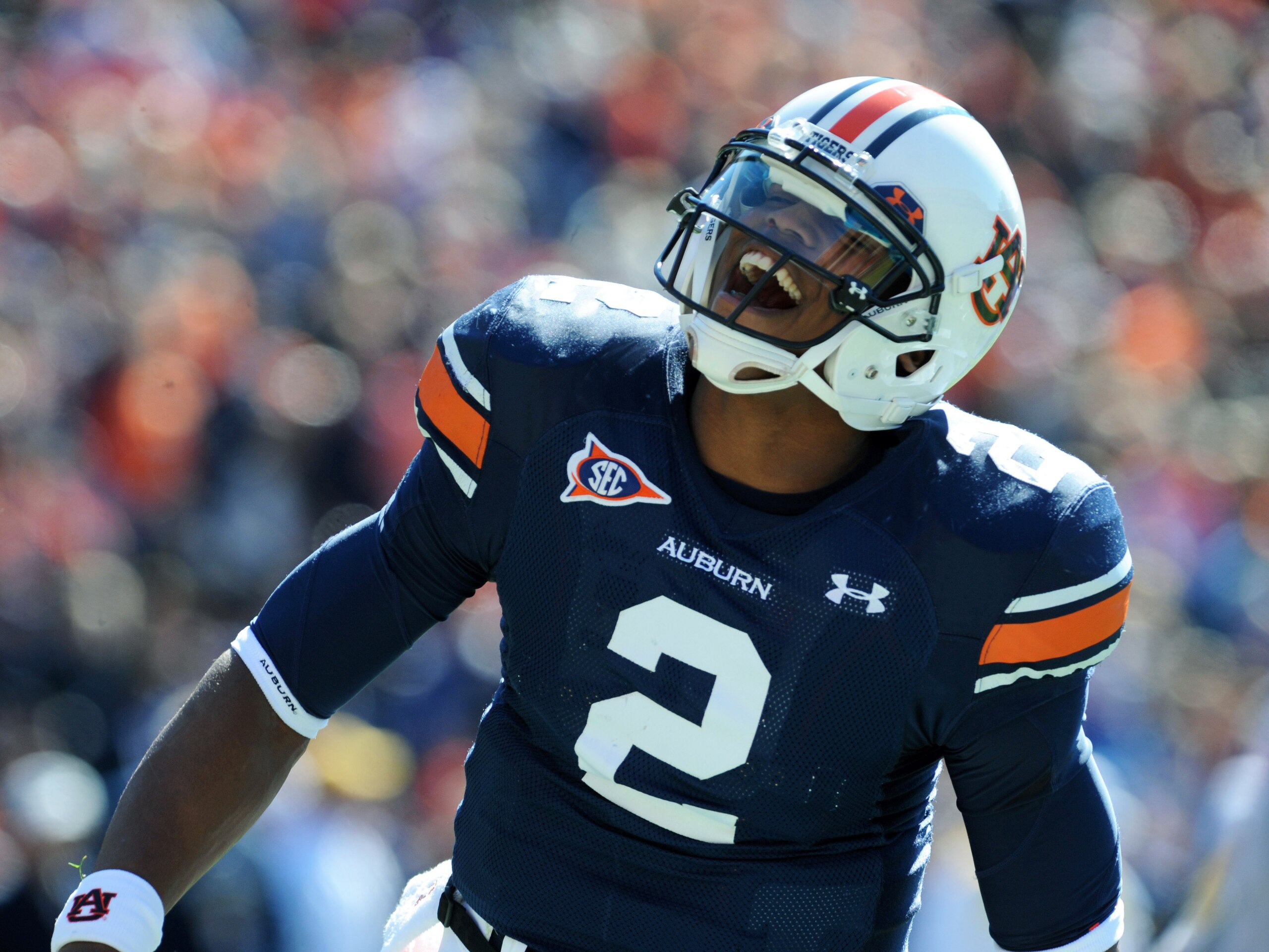 AUBURN, AL - NOVEMBER 6:  Quarterback Cam Newton #2 of the Auburn Tigers celebrates a touchdown against the Chattanooga Mocs November 6, 2010 at Jordan-Hare Stadium in Auburn, Alabama.  (Photo by Al Messerschmidt/Getty Images)