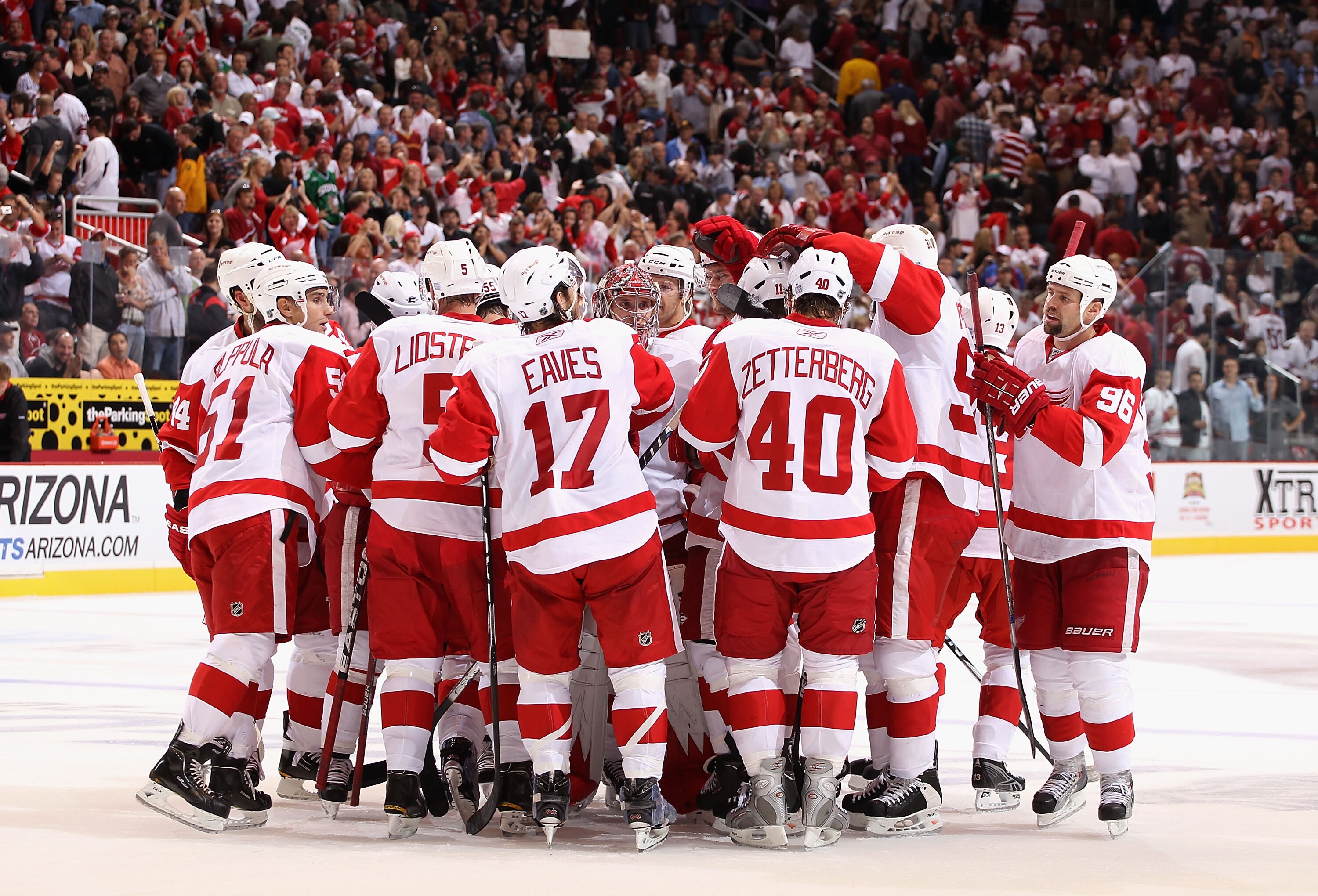 GLENDALE, AZ - OCTOBER 16:  The Detroit Red Wings celebrate after Niklas Kronwall #55 scored the game winning power play goal in overtime against the Phoenix Coyotes during the NHL game at Jobing.com Arena on October16, 2010 in Glendale, Arizona. The Red