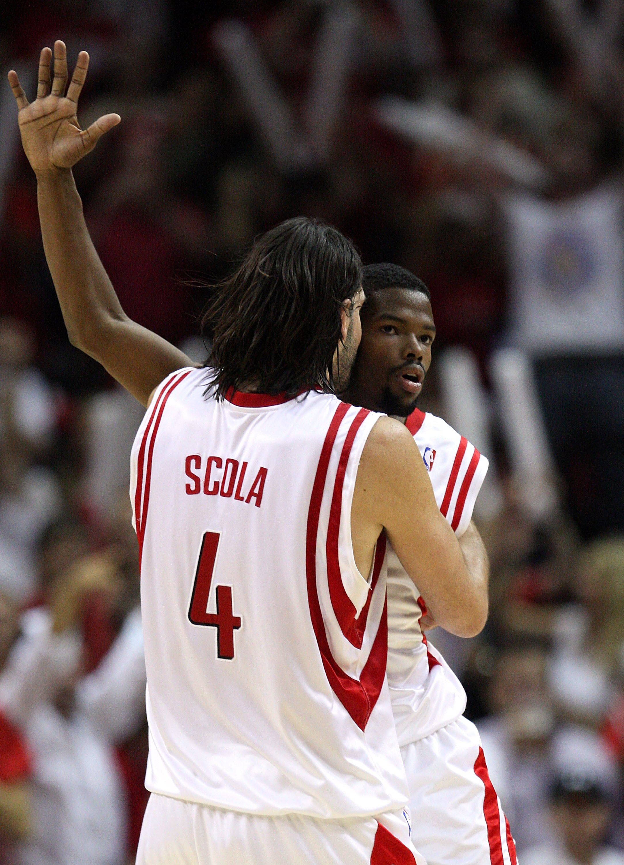 HOUSTON - MAY 10:  Guard Aaron Brooks #0 celebrates a three-point shot with Luis Scola #4 of the Houston Rockets against the Los Angeles Lakers in Game Four of the Western Conference Semifinals during the 2009 NBA Playoffs at Toyota Center on May 10, 2009