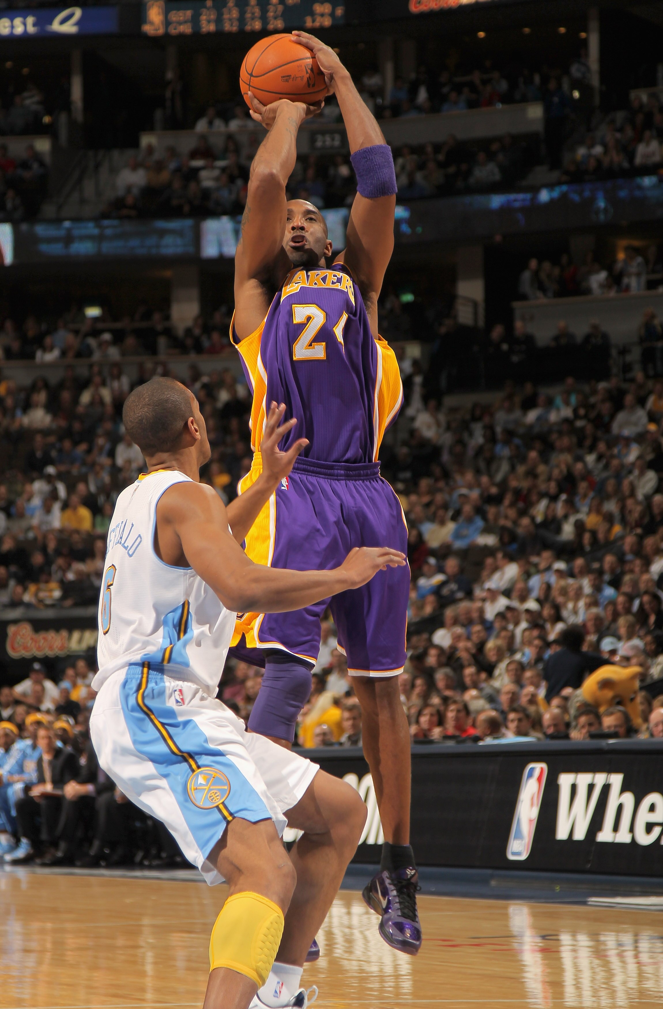 DENVER - NOVEMBER 11:  Kobe Bryant #24 of the Los Angeles Lakers takes a shot over Arron Afflalo #6 of the Denver Nuggets at the Pepsi Center on November 11, 2010 in Denver, Colorado. The Nuggets defeated the Lakers 118-112.  NOTE TO USER: User expressly
