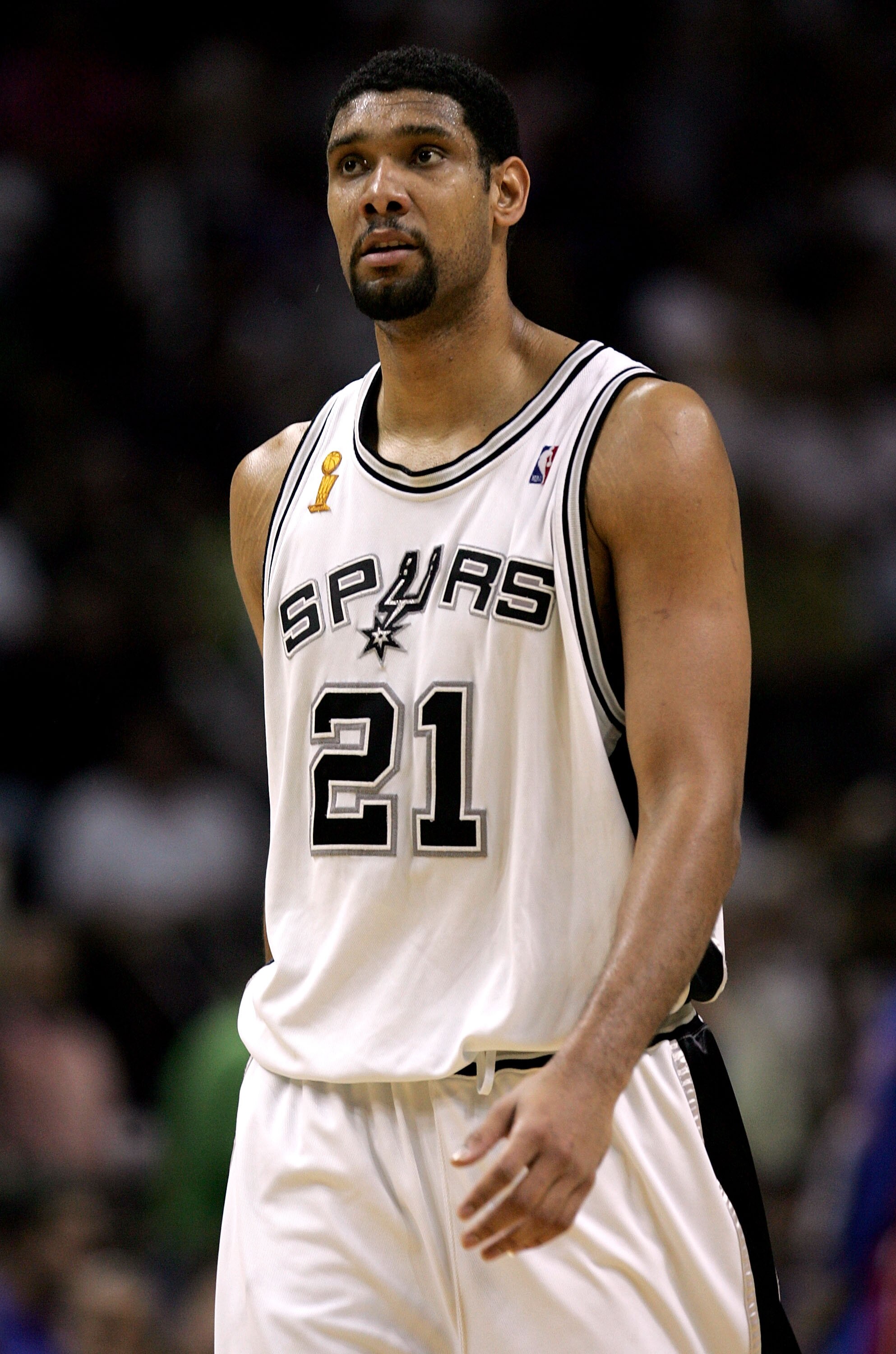 SAN ANTONIO - JUNE 23:  Tim Duncan #21 of the San Antonio Spurs walks upcourt during the game against the Detroit Pistons in Game seven of the 2005 NBA Finals at SBC Center on June 23, 2005 in San Antonio, Texas.  The Spurs defeated the Pistons 81-74 and
