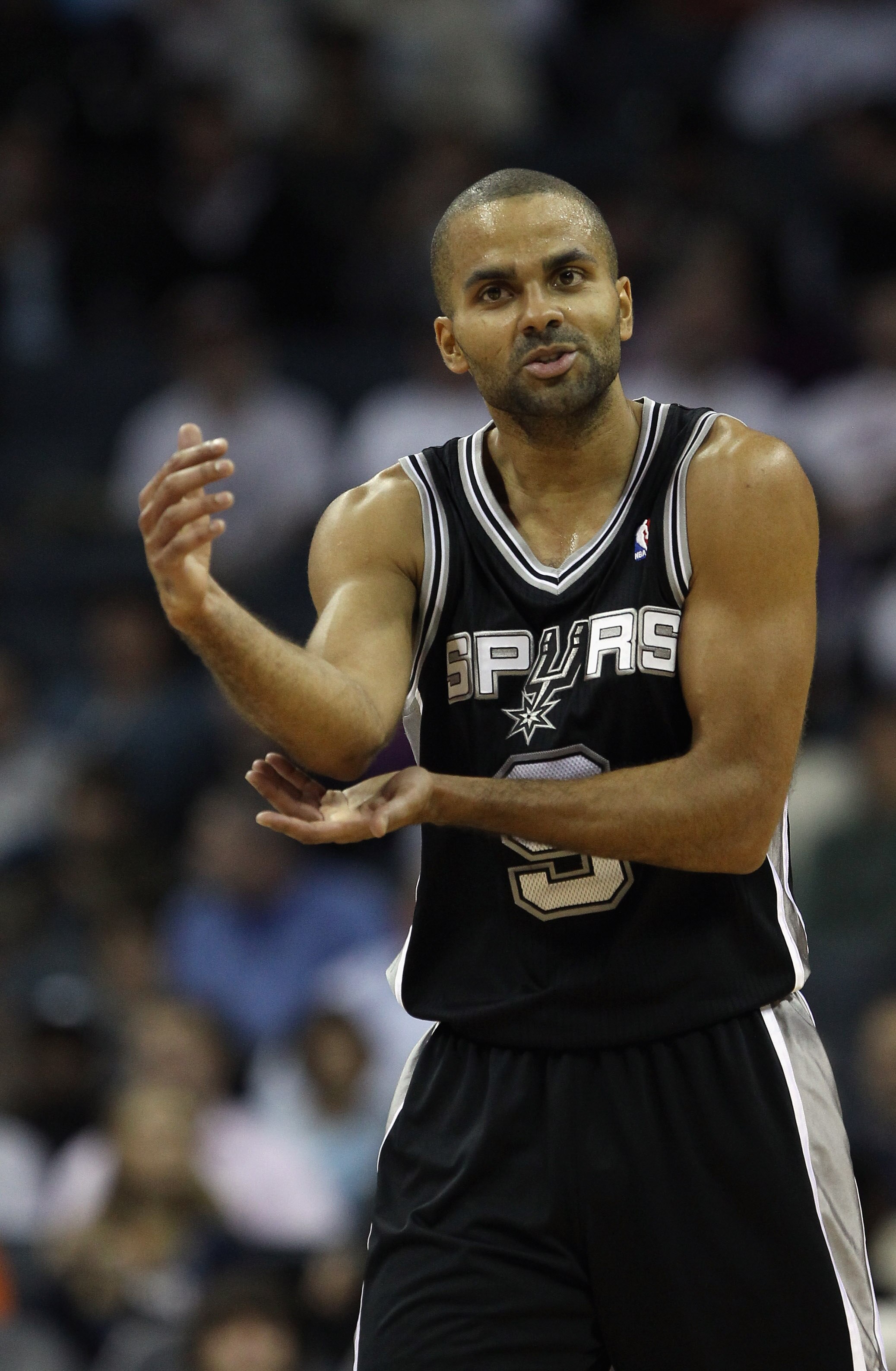 CHARLOTTE, NC - NOVEMBER 08:  Tony Parker #9 of the San Antonio Spurs reacts to a call against the Charlotte Bobcats during their game at Time Warner Cable Arena on November 8, 2010 in Charlotte, North Carolina.  NOTE TO USER: User expressly acknowledges