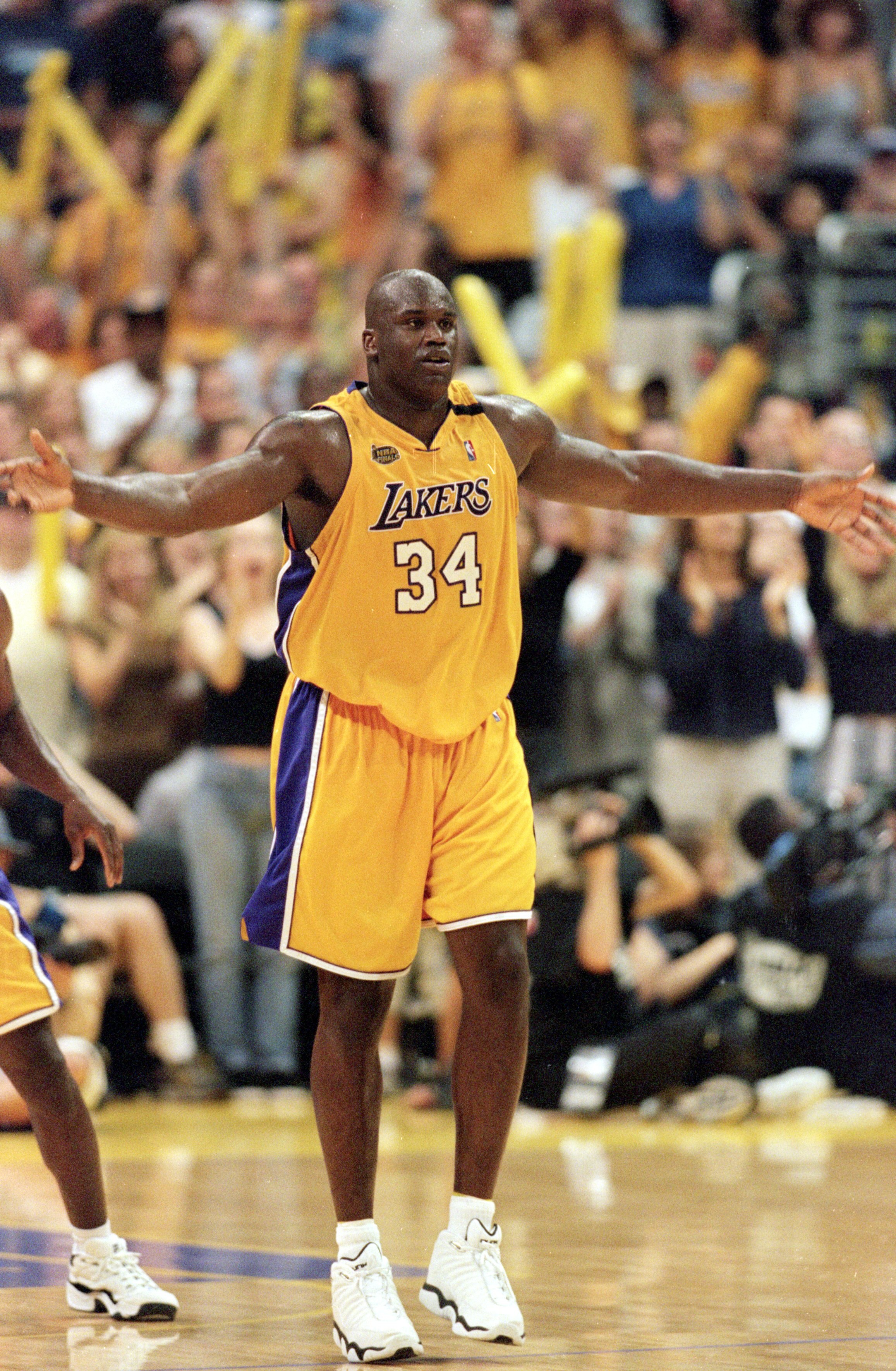 19 Jun 2000:  Shaquille O''Neal #34 of the Los Angeles Lakers celebrates on the court during the NBA Finals Game 6 against the Indiana Pacers at the Staples Center in Los Angeles, California.  The Lakers defeated the Pacers in 116-111.    NOTE TO USER: It