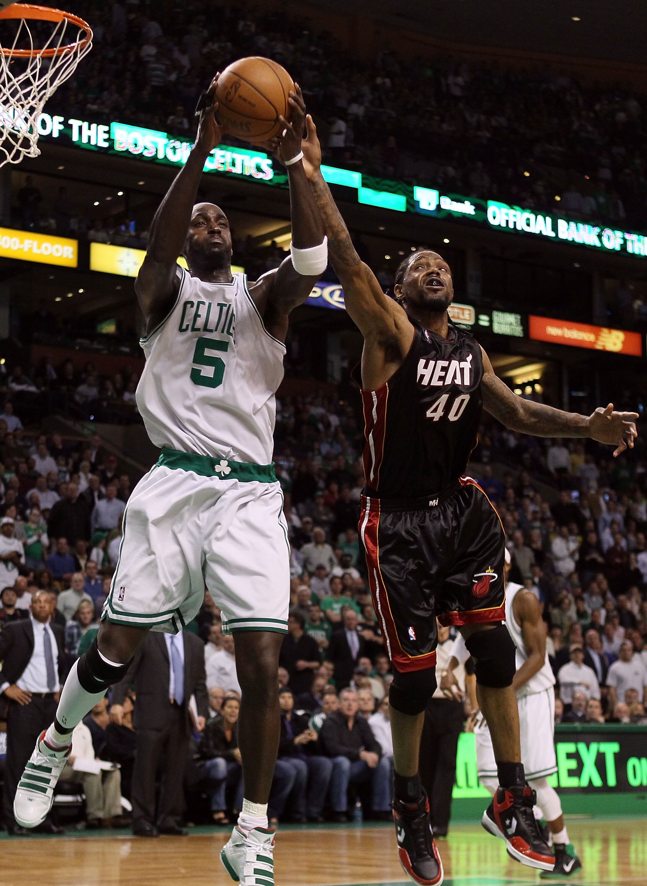 BOSTON - APRIL 27:  Kevin Garnett #5 of the Boston Celtics nabs the rebound from Udonis Haslem #40 of the Miami Heat during Game Five of the Eastern Conference Quarterfinals of the 2010 NBA playoffs at the TD Garden on April 27, 2010 in Boston, Massachuse