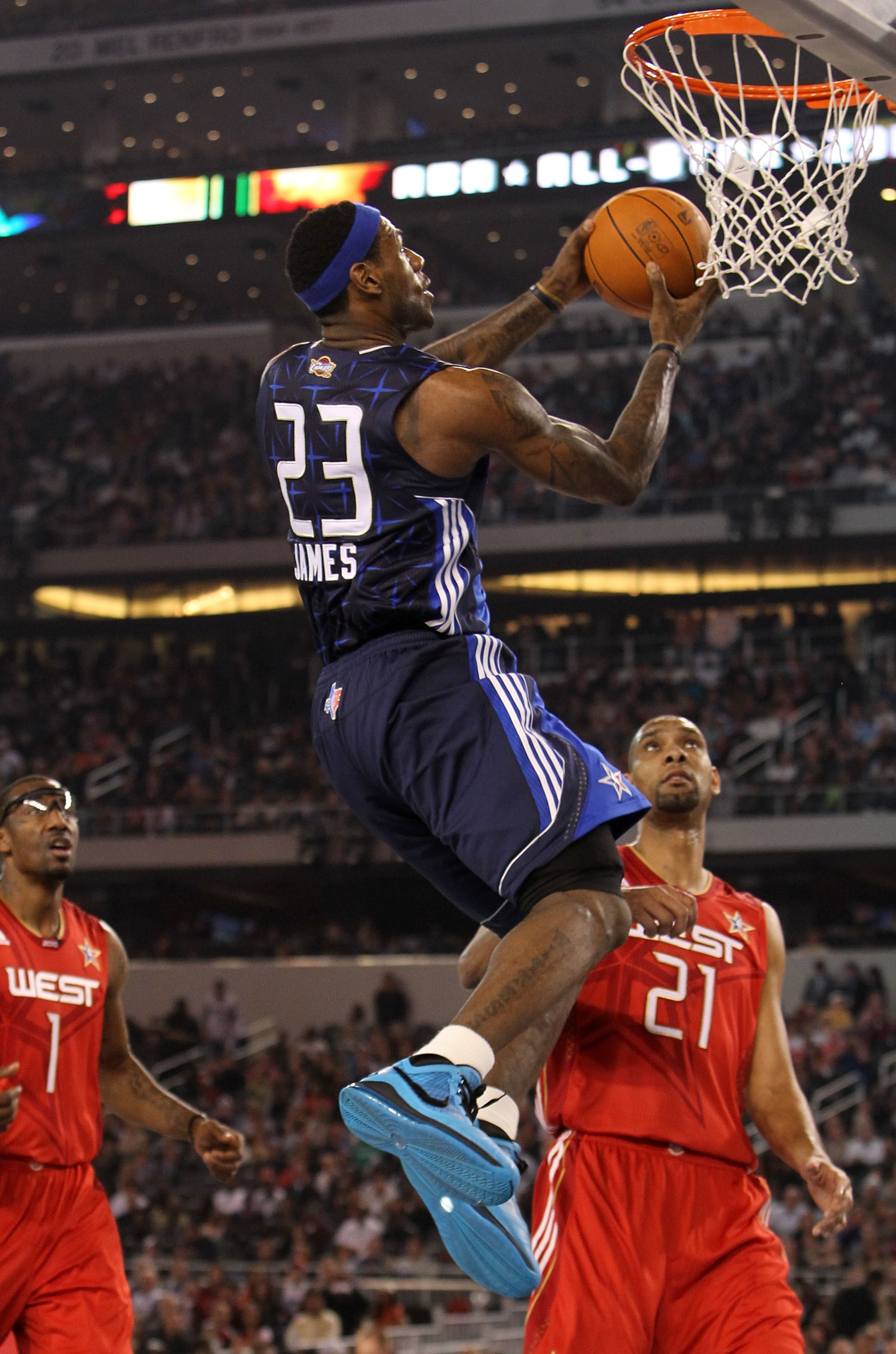 ARLINGTON, TX - FEBRUARY 14:  LeBron James #23 of the Eastern Conference goes up for a shot against Tim Duncan #21 of the Western Conference during the third quarter of the NBA All-Star Game, part of 2010 NBA All-Star Weekend at Cowboys Stadium on Februar