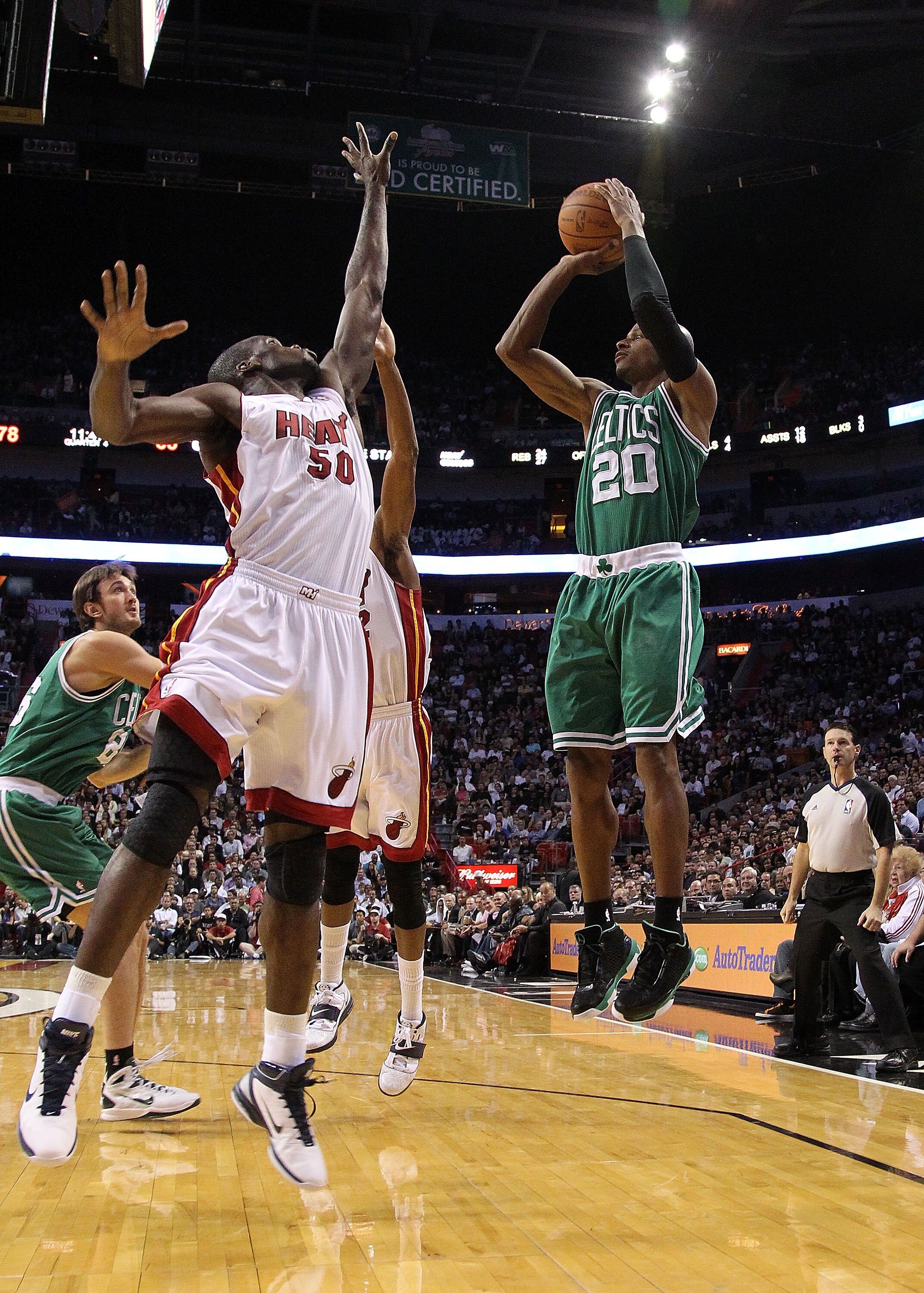 MIAMI - NOVEMBER 11: Ray Allen #20 of the Boston Celtics shoots a jump shot during a game against the Miami Heat at American Airlines Arena on November 11, 2010 in Miami, Florida. NOTE TO USER: User expressly acknowledges and agrees that, by downloading a