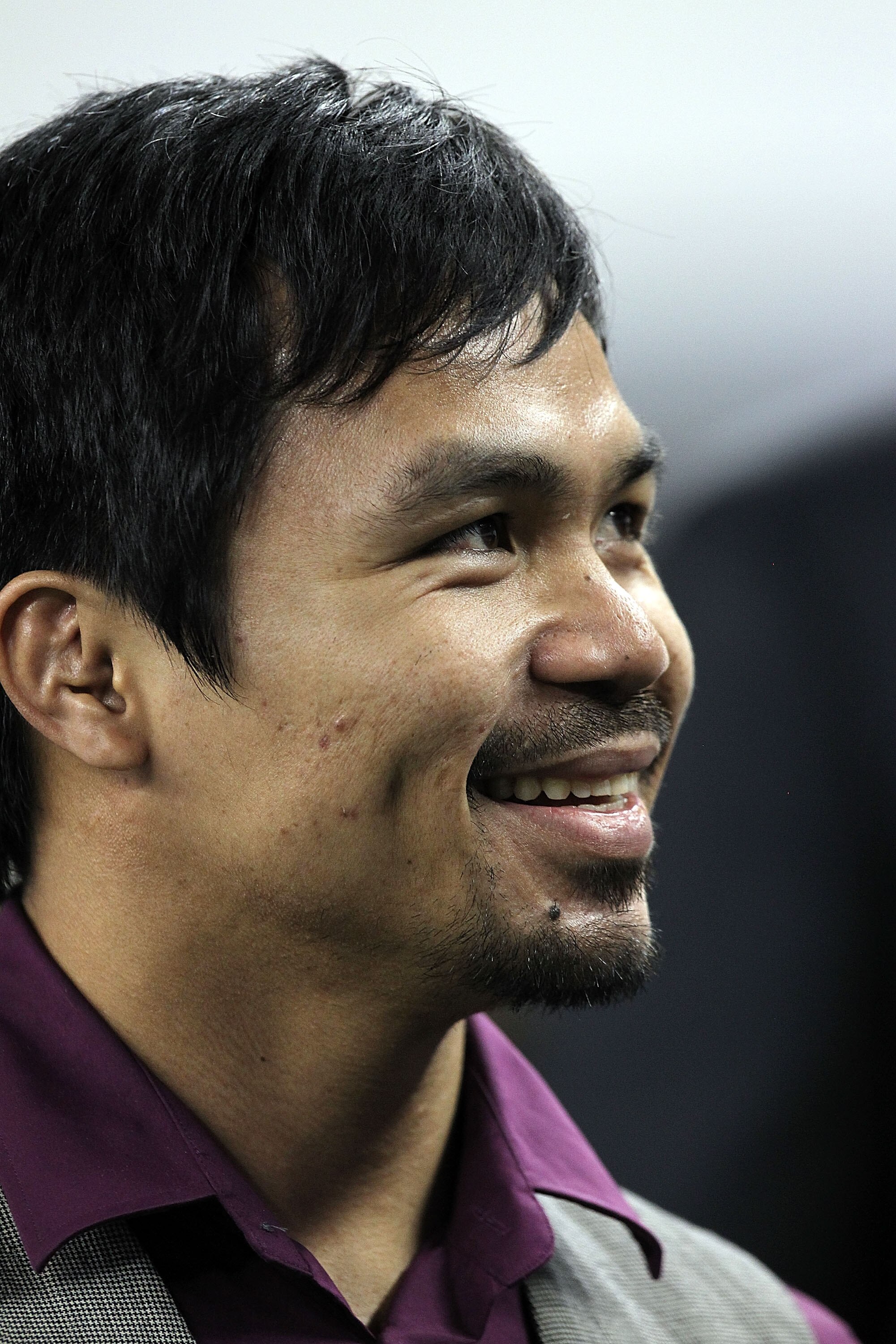 ARLINGTON, TX - SEPTEMBER 02:  Professional boxer Manny Pacquiao watches a preseason game between the Miami Dolphins and the Dallas Cowboys at Cowboys Stadium on September 2, 2010 in Arlington, Texas.  (Photo by Ronald Martinez/Getty Images)