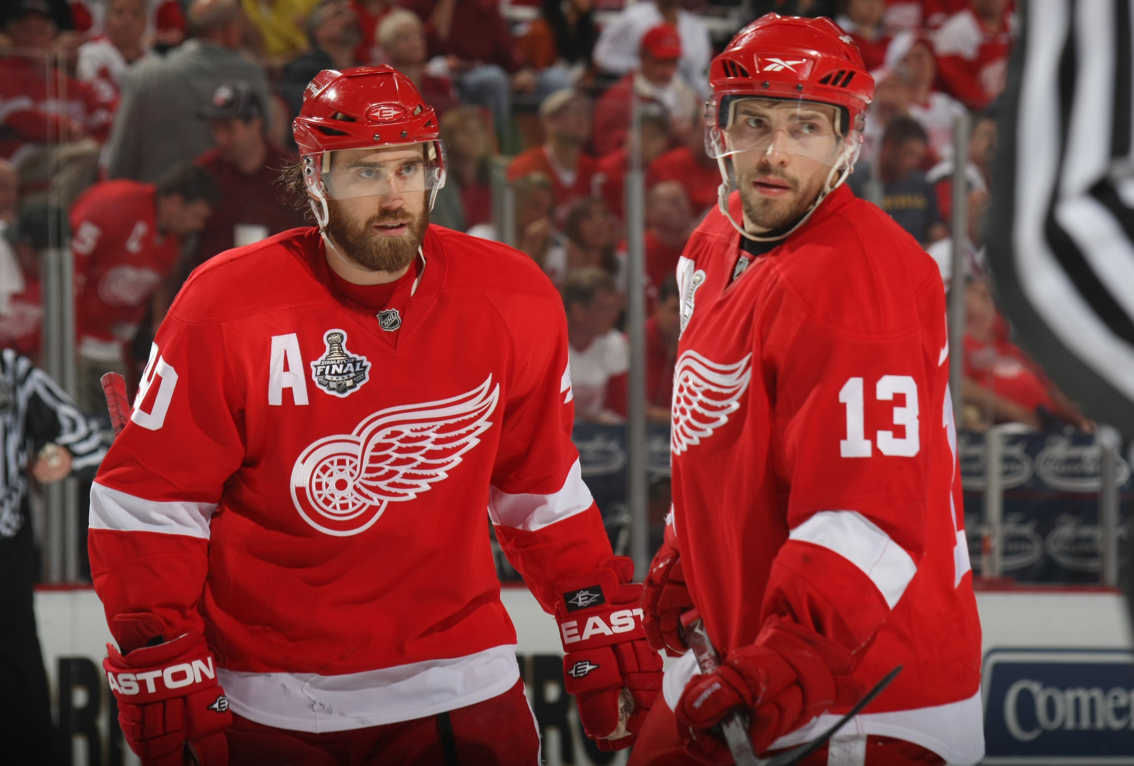 DETROIT - JUNE 6:  Henrik Zetterberg #40 and Pavel Datsyuk #13 of the Detroit Red Wings look on against the Pittsburgh Penguins during Game Five of the 2009 NHL Stanley Cup Finals at Joe Louis Arena on June 6, 2009 in Detroit, Michigan. (Photo by: Bruce B