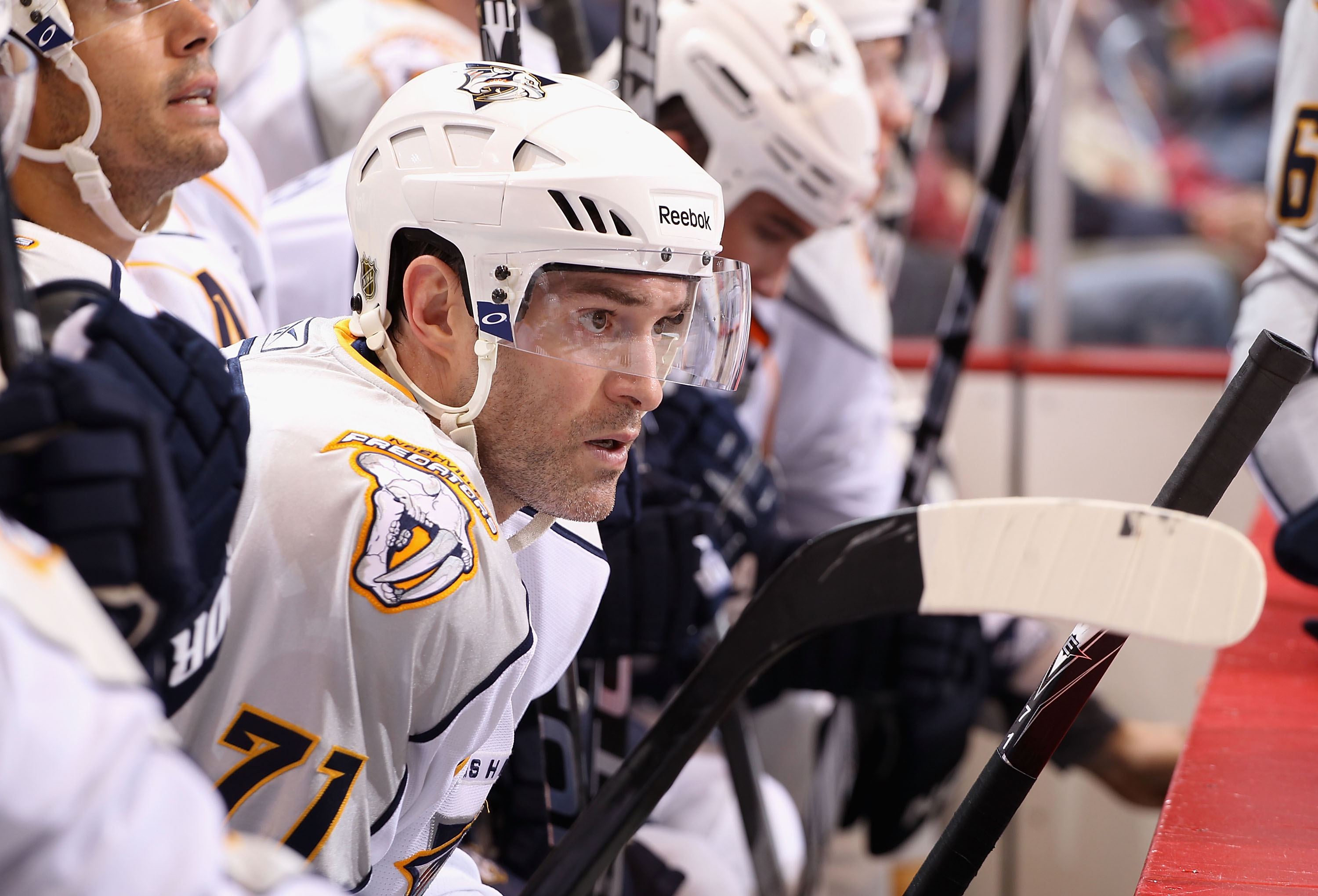 GLENDALE, AZ - NOVEMBER 03:  J.P. Dumont #71 of the Nashville Predators watches from the bench during the NHL game against the Phoenix Coyotes at Jobing.com Arena on November 3, 2010 in Glendale, Arizona.  The Coyotes defeated the Predators 4-3.  (Photo b