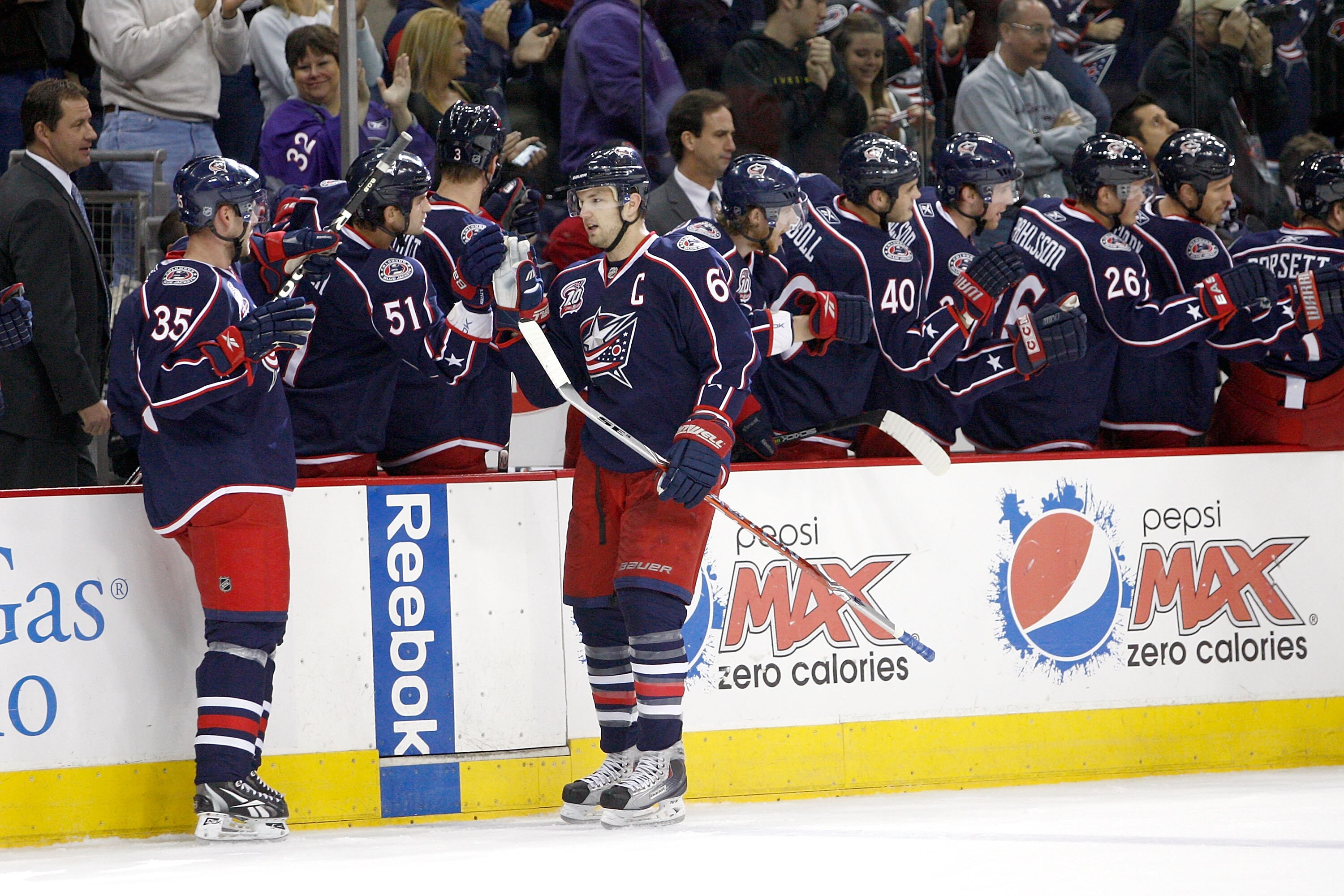 COLUMBUS, OH - NOVEMBER 6:  Rick Nash #61 of the Columbus Blue Jackets is congratulated by his teammates after scoring a goal against the Minnesota Wild during the first period on November 6, 2010 at Nationwide Arena in Columbus, Ohio.  (Photo by John Gri