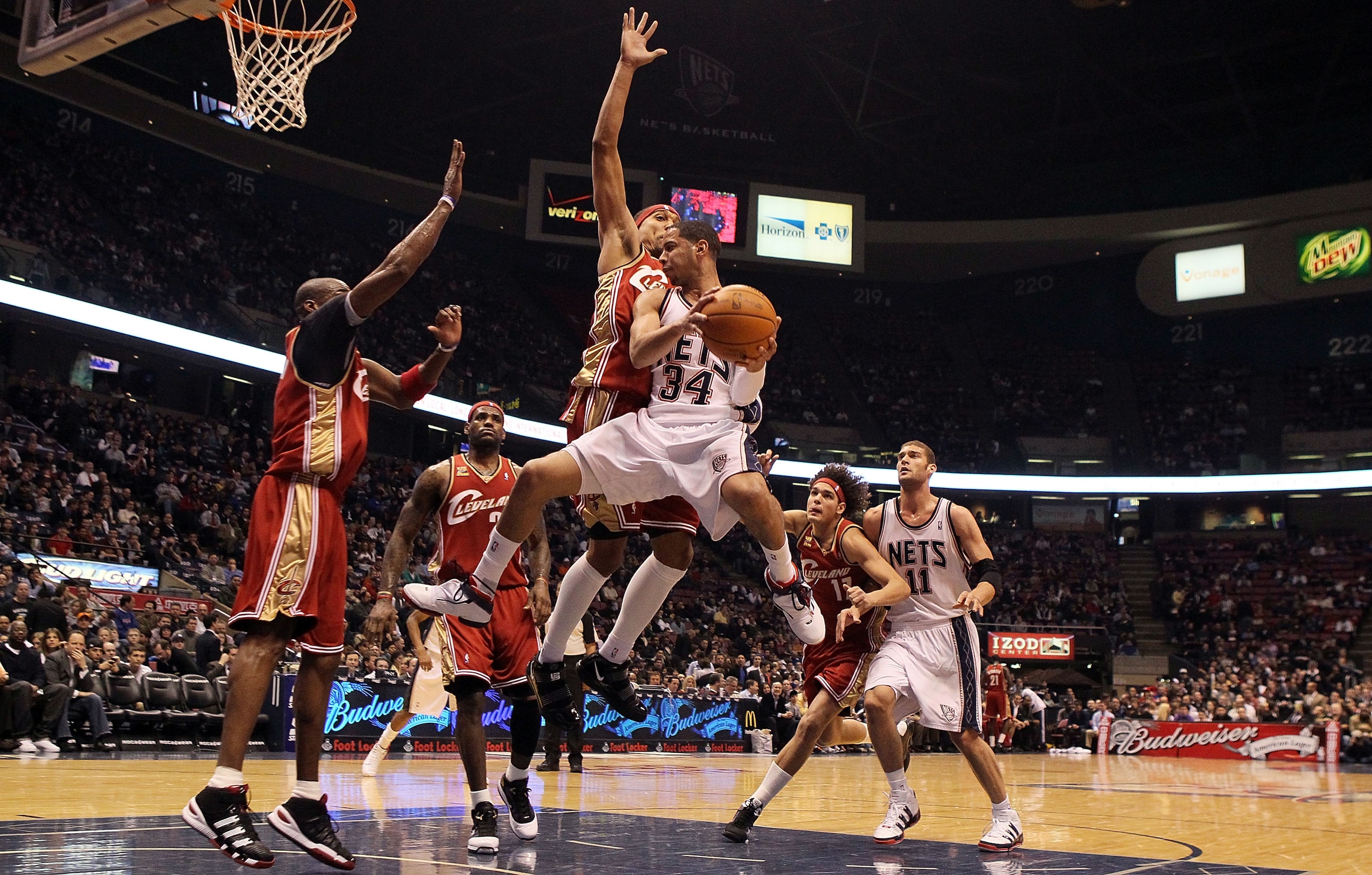 EAST RUTHERFORD, NJ - MARCH 03:  Devin Harris #34 of the New Jersey Nets drives to the hoop against the Cleveland Cavaliers at the Izod Center on March 3, 2010 in East Rutherford, New Jersey.NOTE TO USER: User expressly acknowledges and agrees that, by do