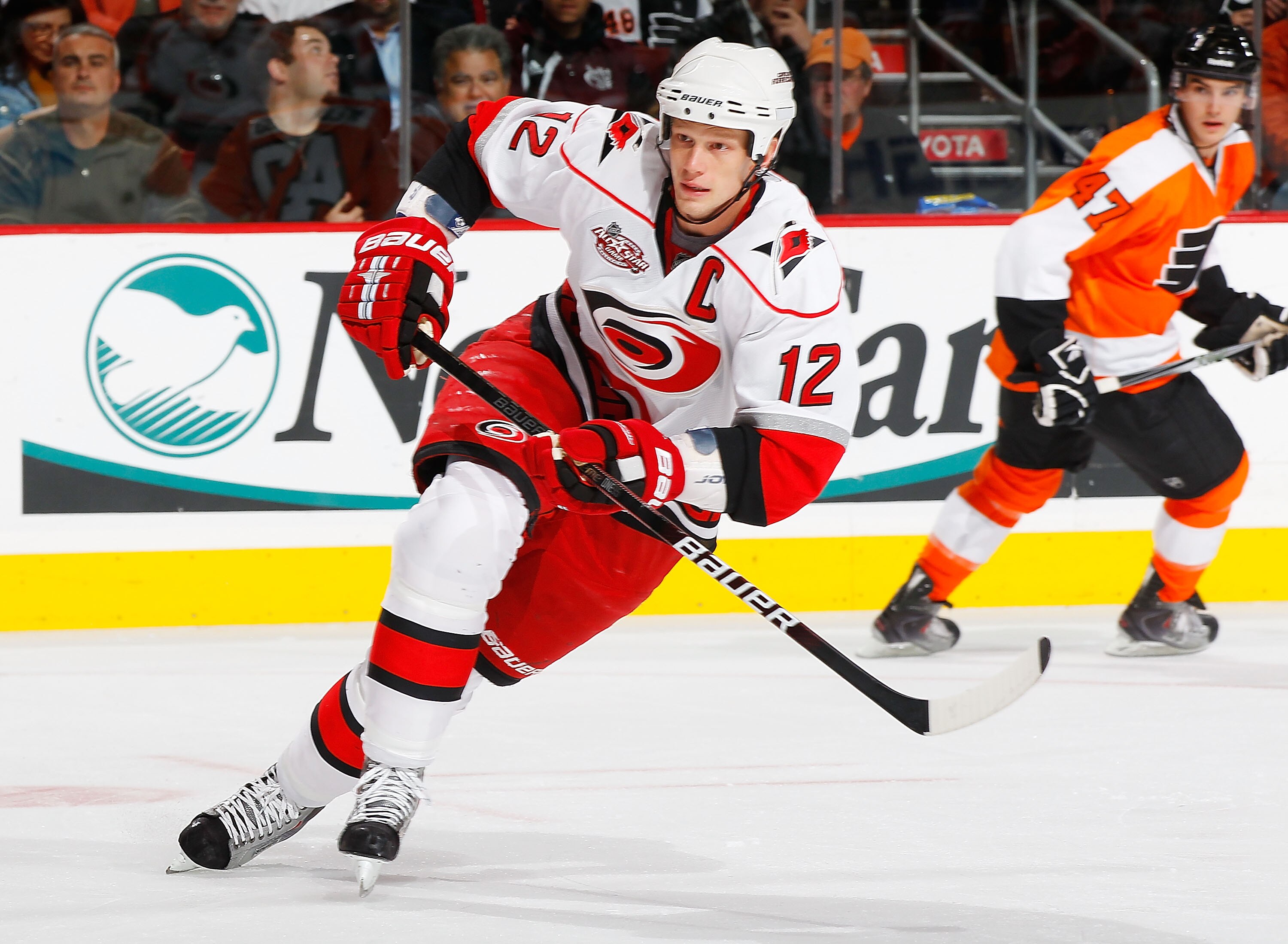 PHILADELPHIA - NOVEMBER 01:  Eric Staal #12 of the Carolina Hurricanes skates against the Philadelphia Flyers on November 1, 2010 at the Wells Fargo Center in Philadelphia, Pennsylvania. Flyers defeat the Hurricanes 3-2.  (Photo by Mike Stobe/Getty Images