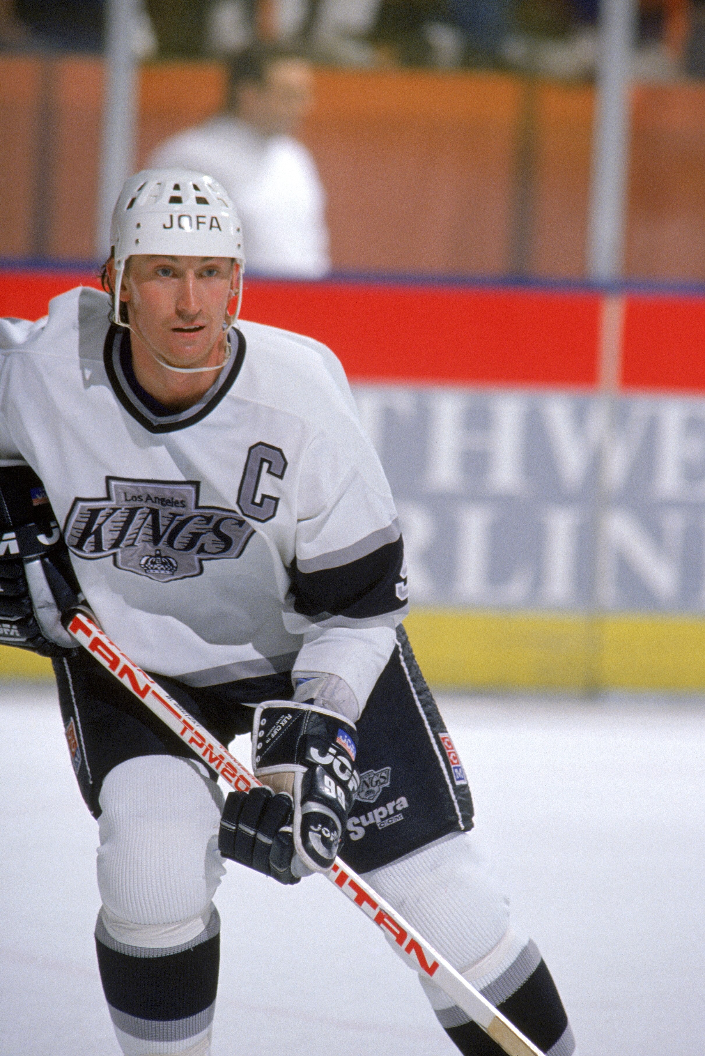INGLEWOOD, CA - 1990:  Wayne Gretzky #99 of the Los Angeles Kings skates during a game in 1990 at the Great Western Forum in Inglewood, California.  Wayne Gretzky played for the Kings from 1988 - 1996.  (Photo by Mike Powell/Getty Images)