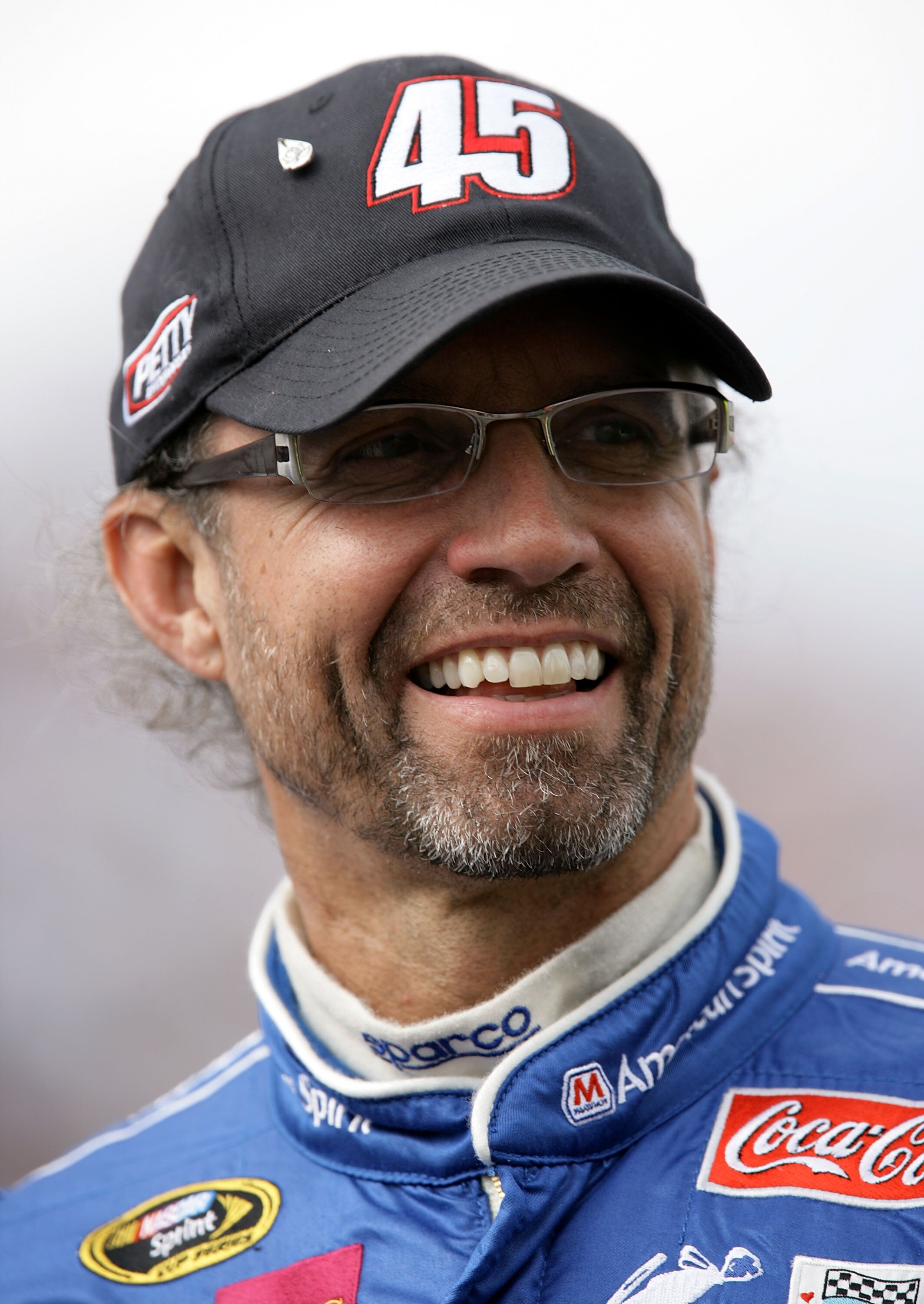 MARTINSVILLE, VA - MARCH 28:  Kyle Petty, driver of the #45 Marathon American Spirit Motor Oil Dodge, stands on the grid during qualifying for the NASCAR Sprint Cup Series Goody's Cool Orange 500 at Martinsville Speedway on March 28, 2008 in Martinsville,