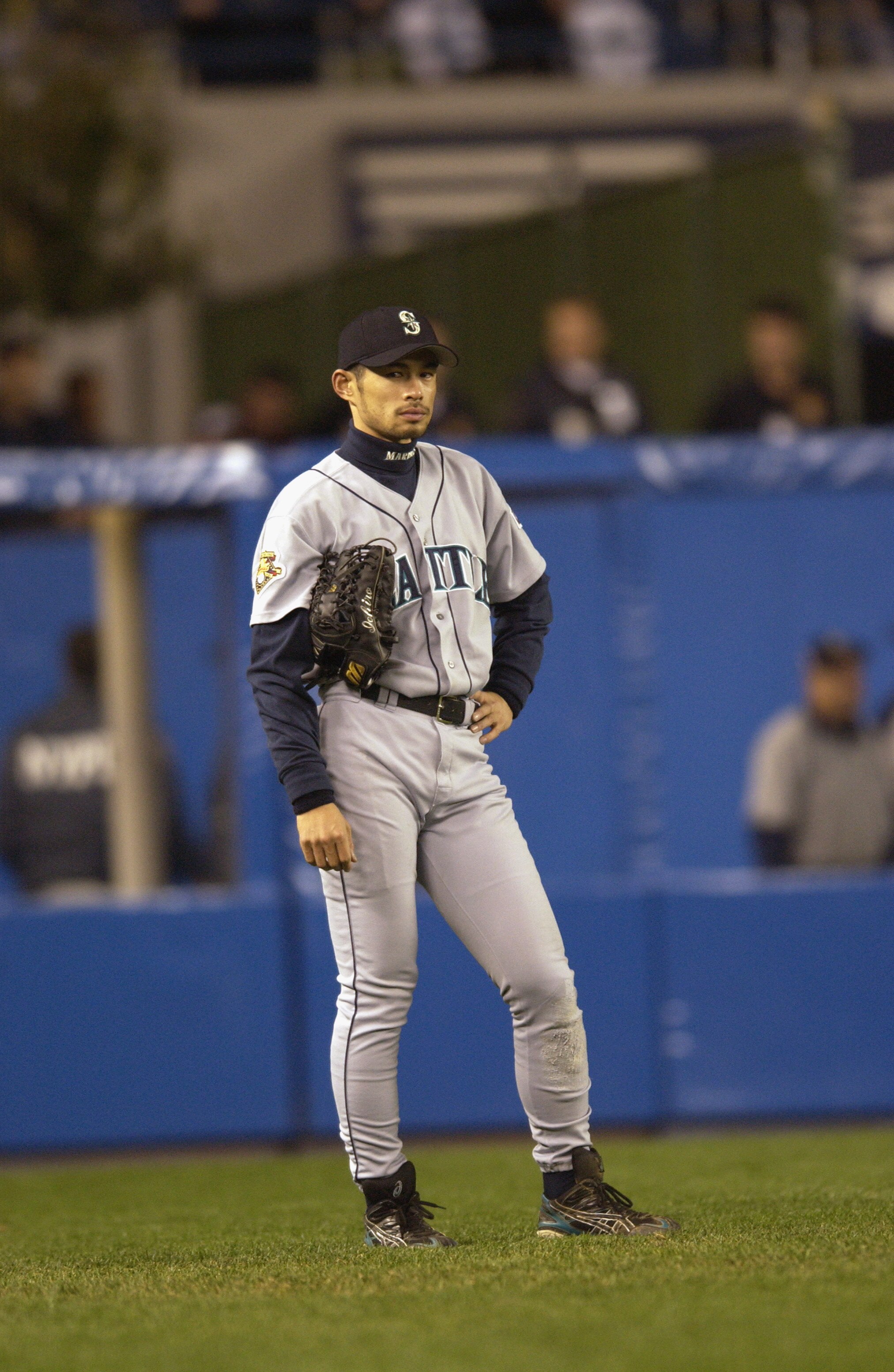 BRONX, NY - OCTOBER 22:  Leftfielder Ichiro Suzuki #51 of the Seattle Mariners looks on from his position against the New York Yankees during game five of the American League Championship Series on October 22, 2001 at Yankee Stadium in the Bronx, New York