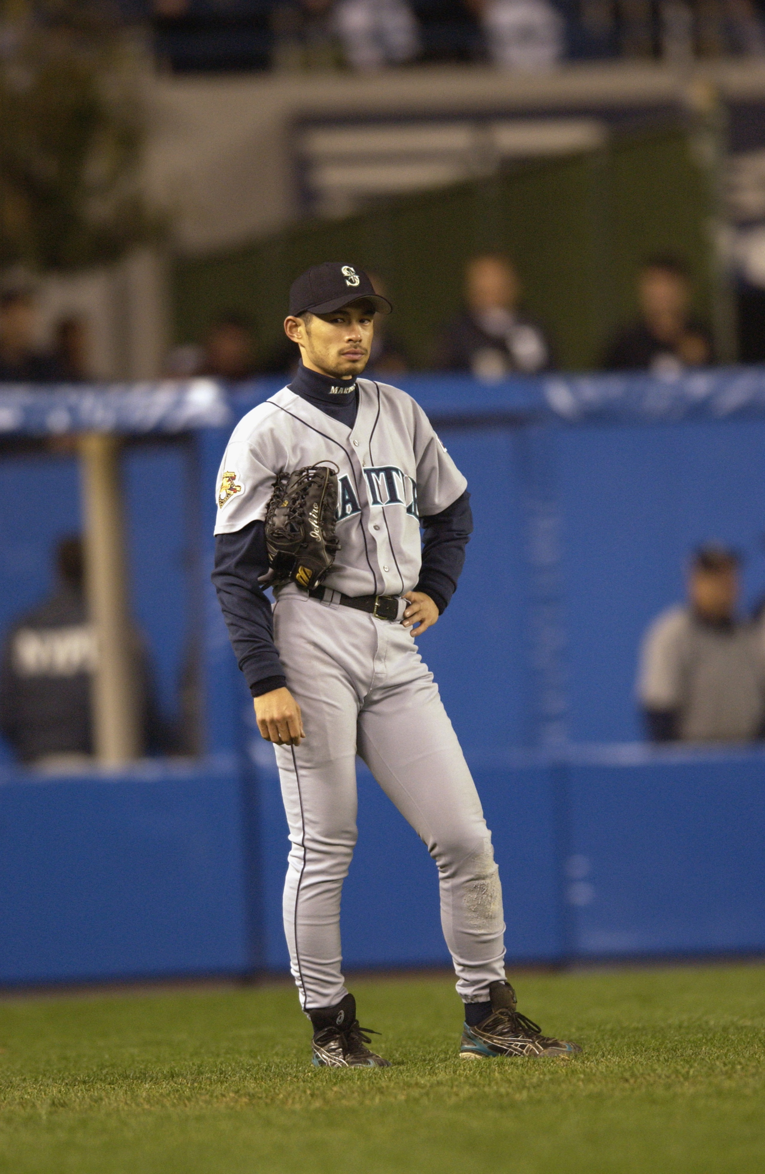 BRONX, NY - OCTOBER 22:  Leftfielder Ichiro Suzuki #51 of the Seattle Mariners looks on from his position against the New York Yankees during game five of the American League Championship Series on October 22, 2001 at Yankee Stadium in the Bronx, New York