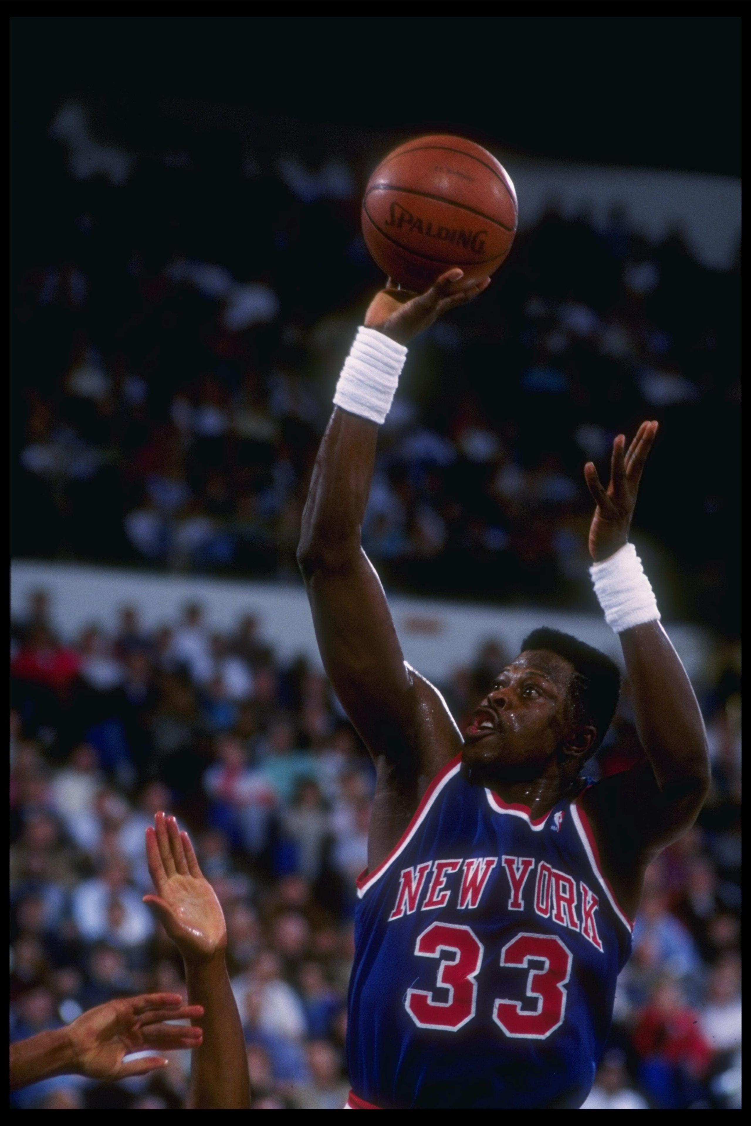 1990-1991:  Center Patrick Ewing of the New York Knicks goes up for two during a game against the Golden State Warriors at the Oakland Coliseum Arena in Oakland, California. Mandatory Credit: Otto Greule Jr.  /Allsport