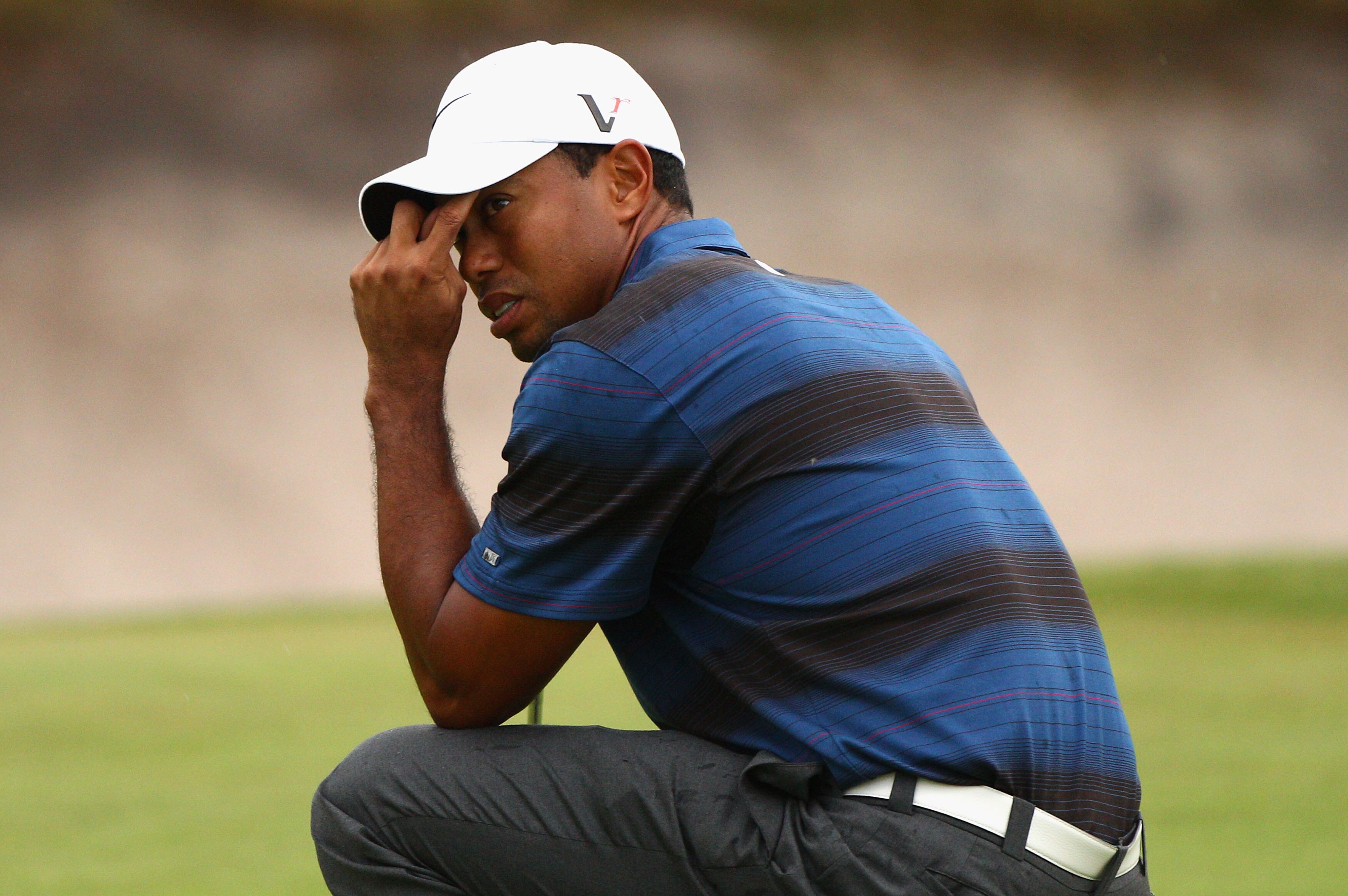 MELBOURNE, AUSTRALIA - NOVEMBER 12:  Tiger Woods of the USA looks dejected after missing a putt during day two of the Australian Masters at The Victoria Golf Club on November 12, 2010 in Melbourne, Australia.  (Photo by Ryan Pierse/Getty Images)