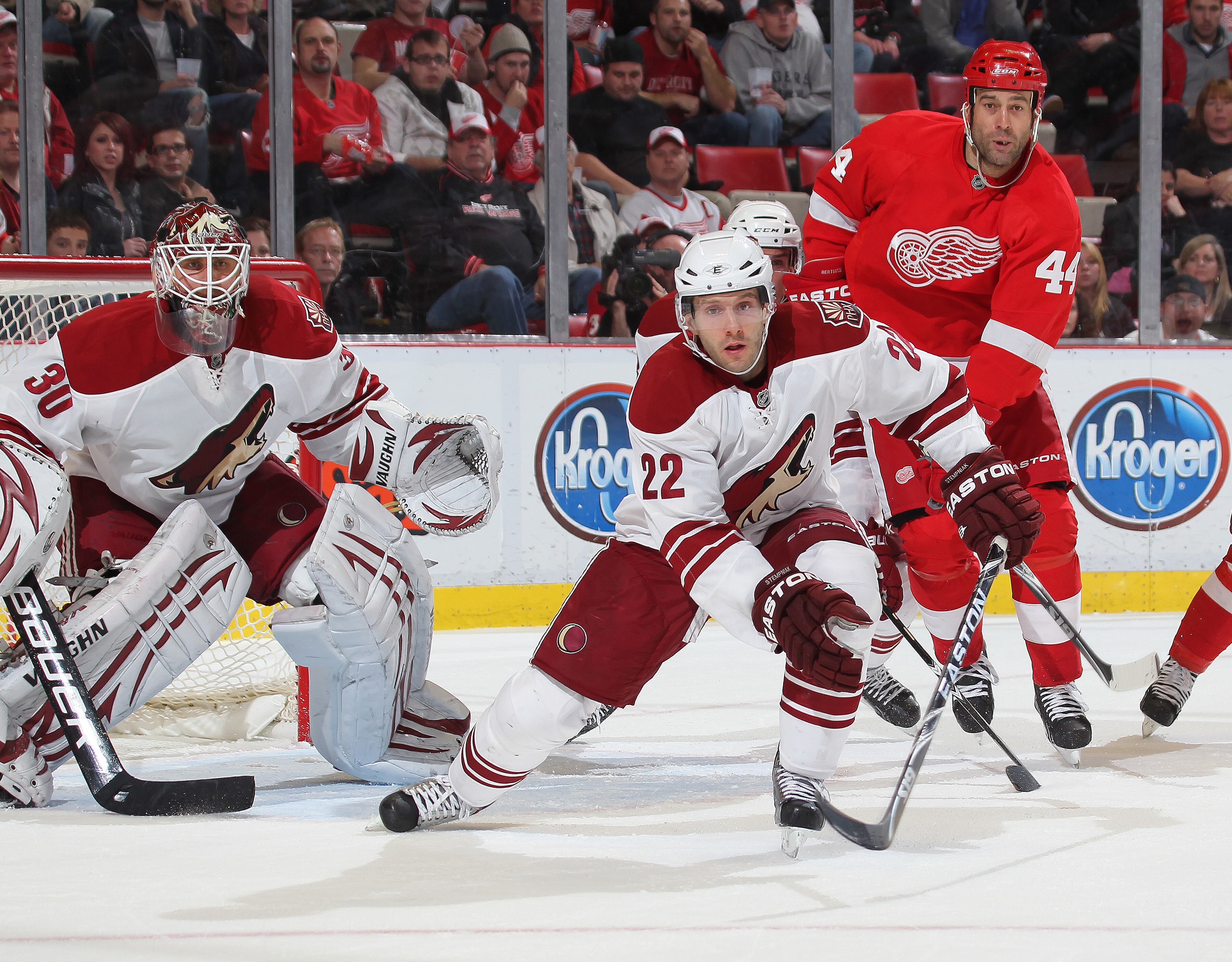 DETROIT,MI - NOVEMBER 8:  Lee Stempniak #22 and IIya Bryzgalov #30 of the Phoenix Coyotes wait for a shot to come in with Todd Bertuzzi #44 of the Detroit Red Wings set to pounce on a rebound in a game on November 8,2010 at the Joe Louis Arena in Detroit,
