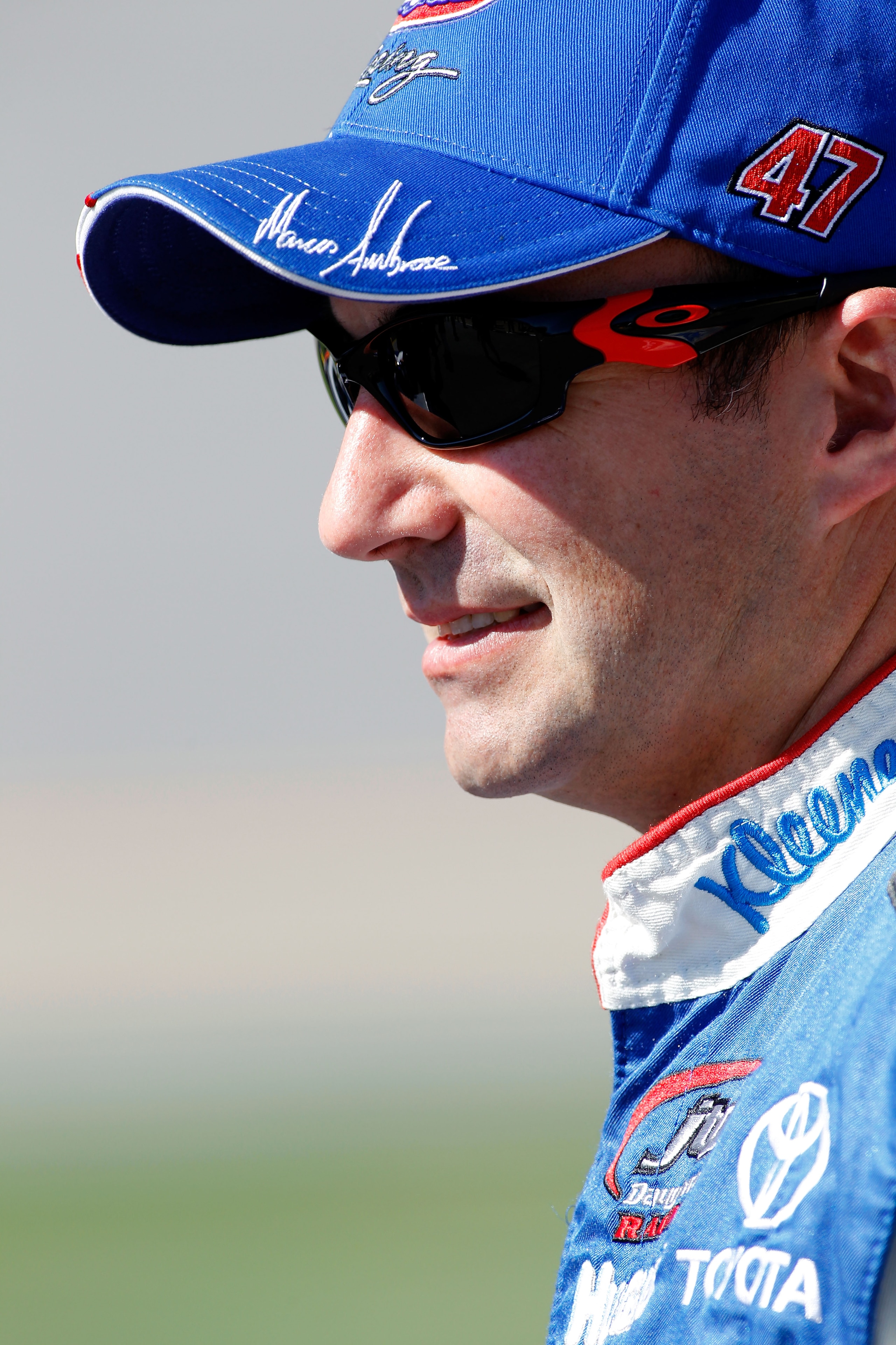 TALLADEGA, AL - OCTOBER 30:  Marcos Ambrose, driver of the #47 Kleenex/CloroxToyota, walks on pit road during qualifying for the NASCAR Sprint Cup Series AMP Energy Juice 500 at Talladega Superspeedway on October 30, 2010 in Talladega, Alabama.  (Photo by
