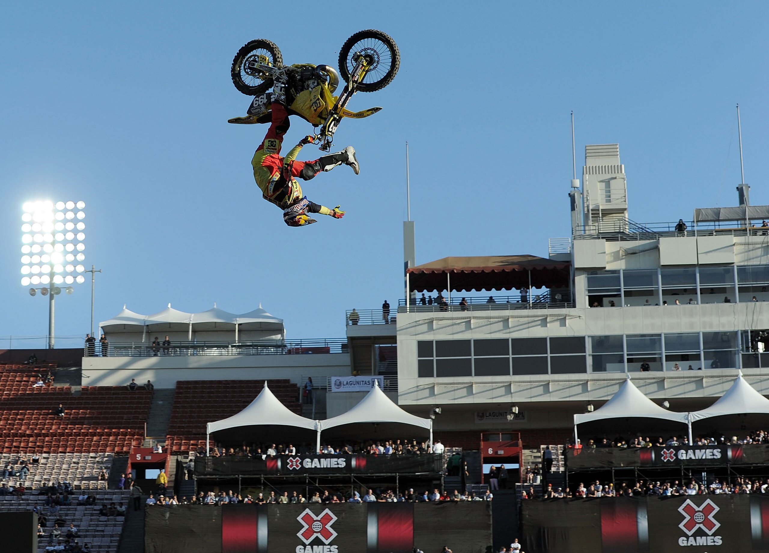LOS ANGELES, CA - JULY 29:  Travis Pastrana competes in the Moto X Freestyle Final during X Games 16 at the LA Coliseum on July 29, 2010 in Los Angeles, California. Pastrana would win the gold medal.  (Photo by Harry How/Getty Images)