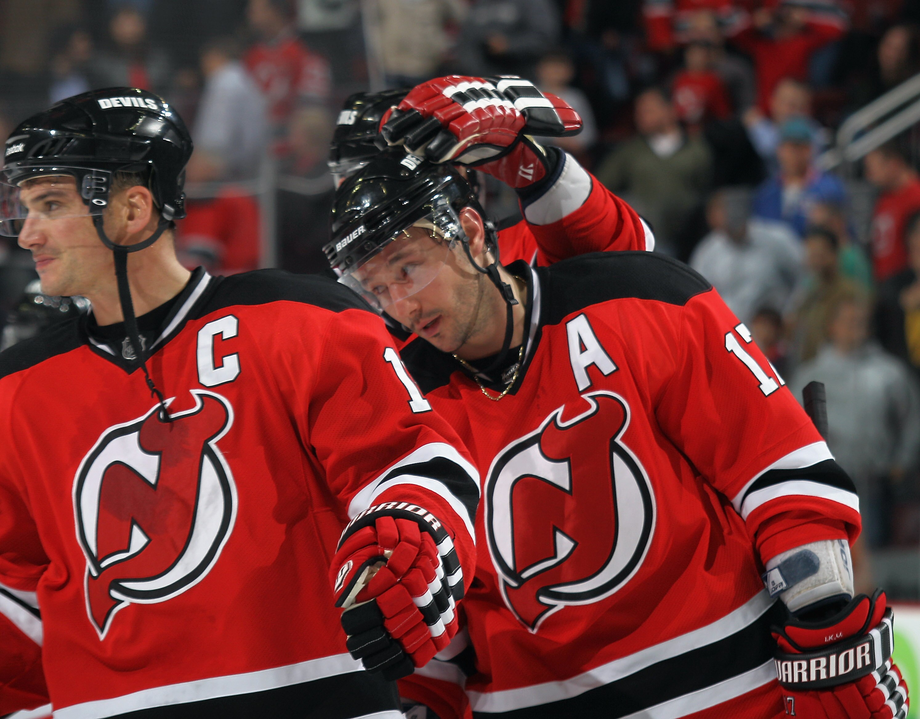 NEWARK, NJ - NOVEMBER 10: Ilya Kovalchuk #17 of the New Jersey Devils is consoled after missing a shootout chance against the Buffalo Sabres at the Prudential Center on November 10, 2010 in Newark, New Jersey. The Sabres defeated the Devils 5-4 in the sho