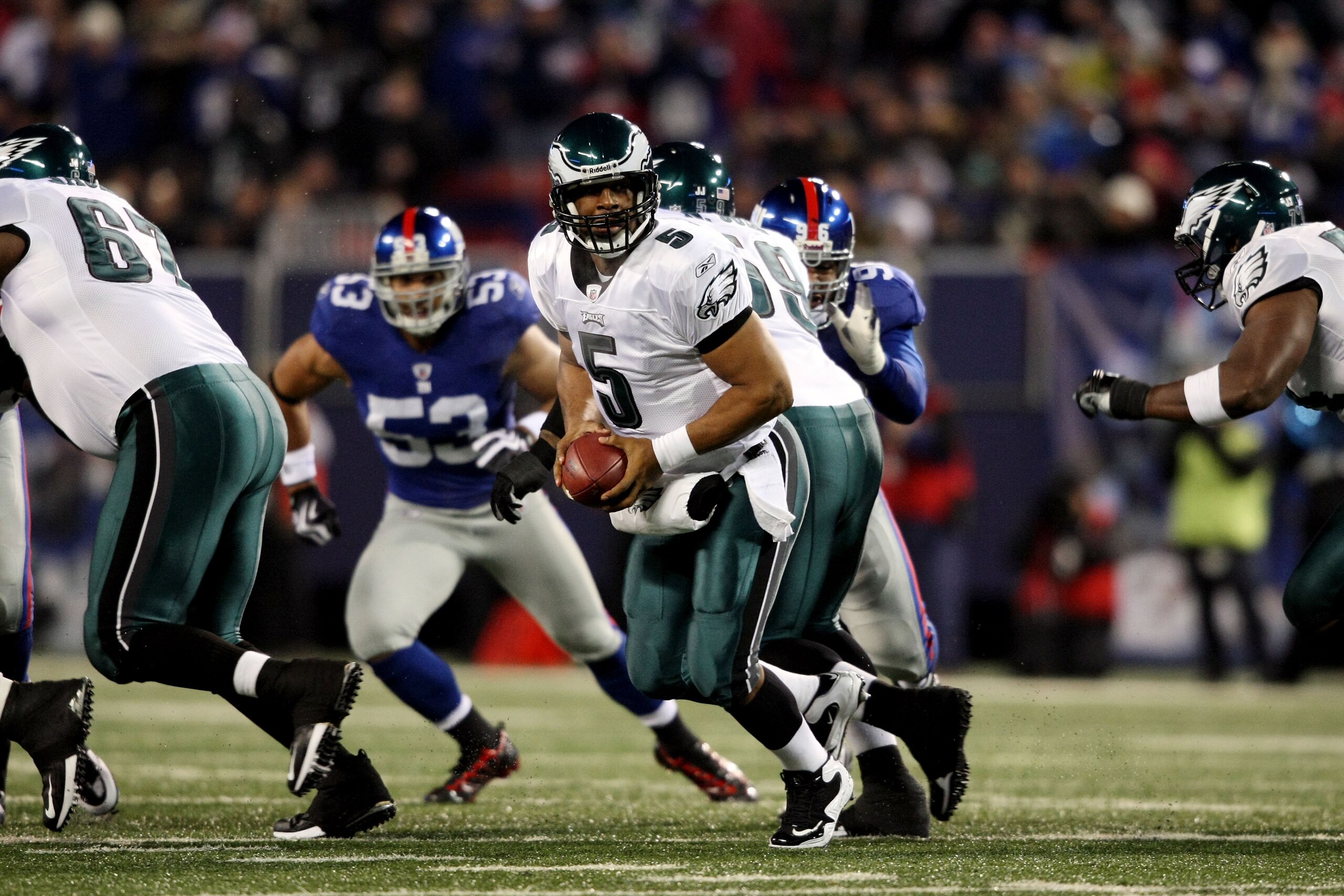 EAST RUTHERFORD, NJ - DECEMBER 13:  Donovan McNabb #5 of the Philadelphia Eagles looks to pass against the New York Giants at Giants Stadium on December 13, 2009 in East Rutherford, New Jersey.  (Photo by Nick Laham/Getty Images)