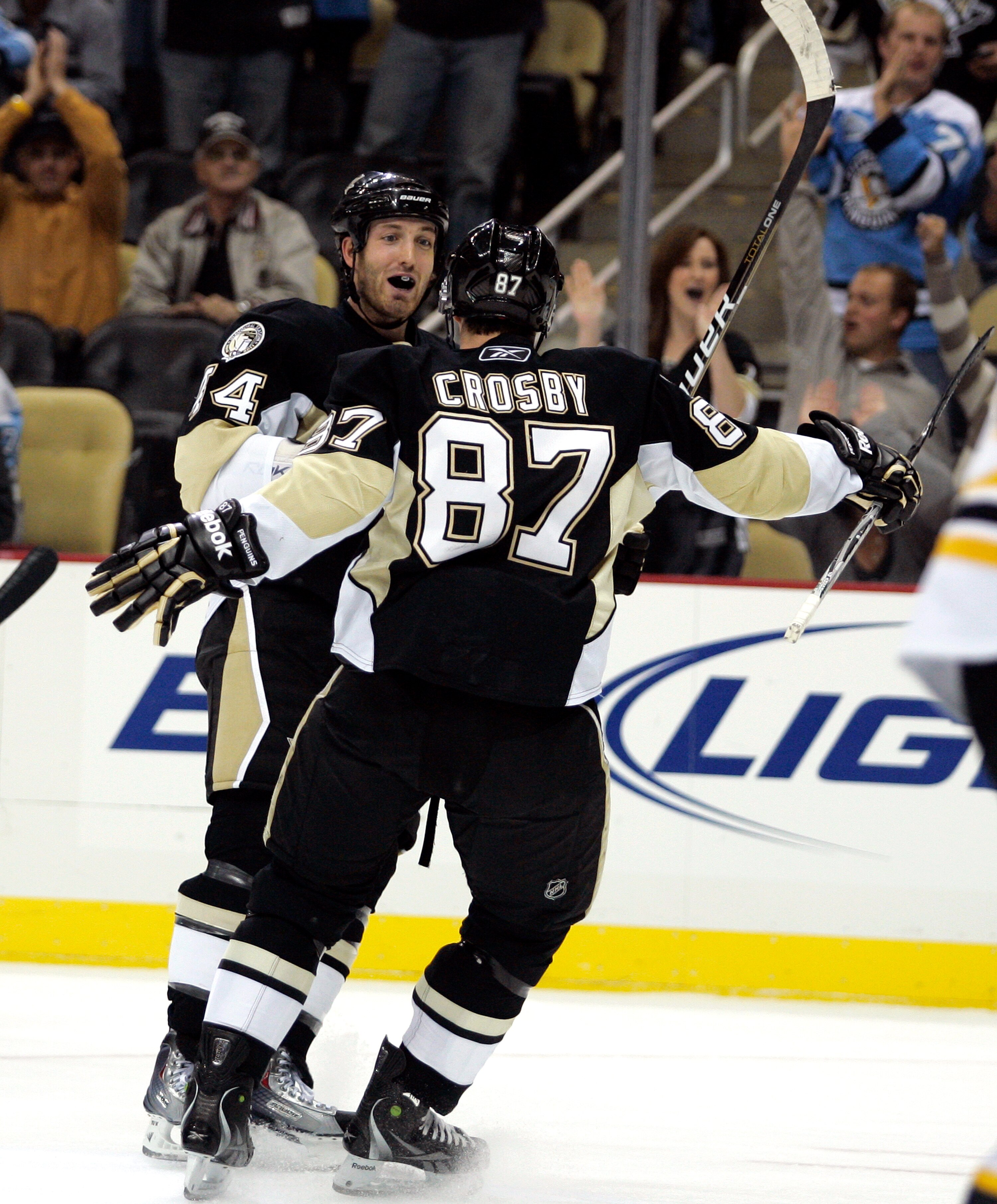 PITTSBURGH - NOVEMBER 10:  Brooks Orpik #44 of the Pittsburgh Penguins celebrates his goal first period goal with Sidney Crosby #87 against the Boston Bruins at Consol Energy Center on November 10, 2010 in Pittsburgh, Pennsylvania.  (Photo by Justin K. Al