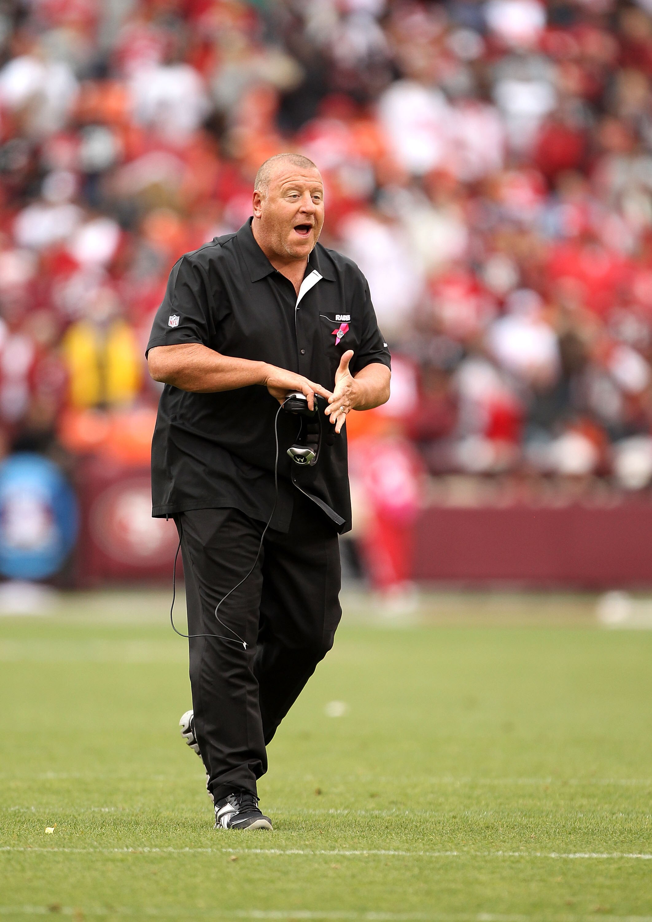SAN FRANCISCO - OCTOBER 17:  Head coach Tom Cable of the Oakland Raiders walks the sidelines during their game against the San Francisco 49ers at Candlestick Park on October 17, 2010 in San Francisco, California.  (Photo by Ezra Shaw/Getty Images)