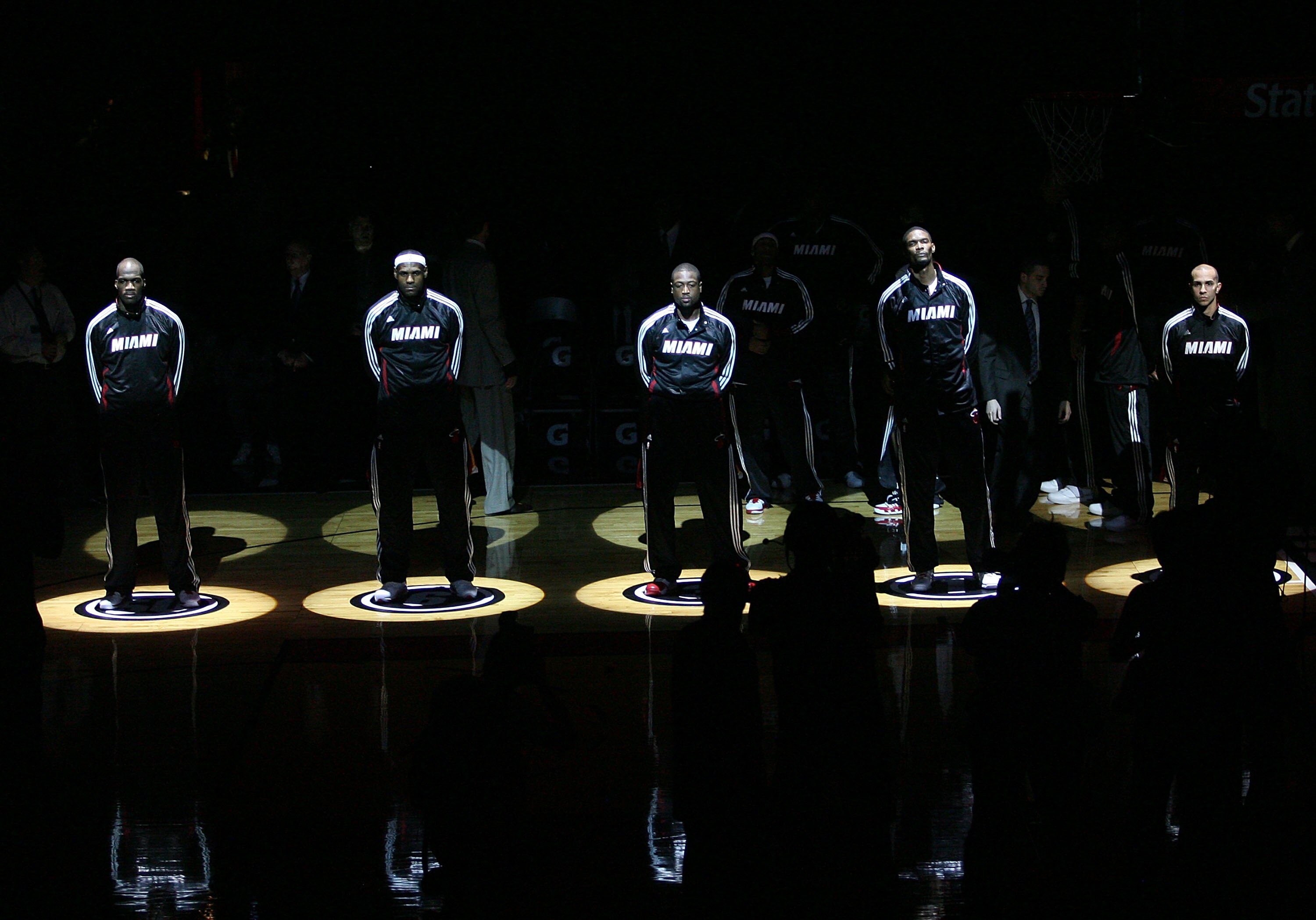MIAMI - NOVEMBER 06:  (L-R) Joel Anthony #50, LeBron James #6, Dwyane Wade #3, CXhris Bosh #1 and Carlos Arroyo # of the Miami Heat are introduced against the New Jersey Nets  at American Airlines Arena on November 6, 2010 in Miami, Florida. NOTE TO USER: