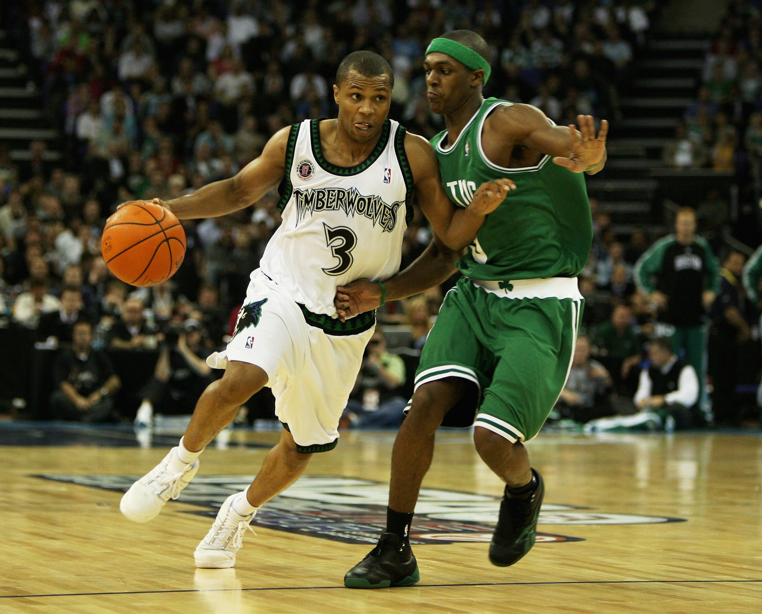LONDON - OCTOBER 10:  Sebastian Telfair #3 of Minnesota is challenged by Rajon Rondo of Boston during NBA Europe Live 2007 Tour match between the Boston Celtics and the Minnesota Timberwolves at the O2 Arena on October 10, 2007 in London, England.  NOTE T