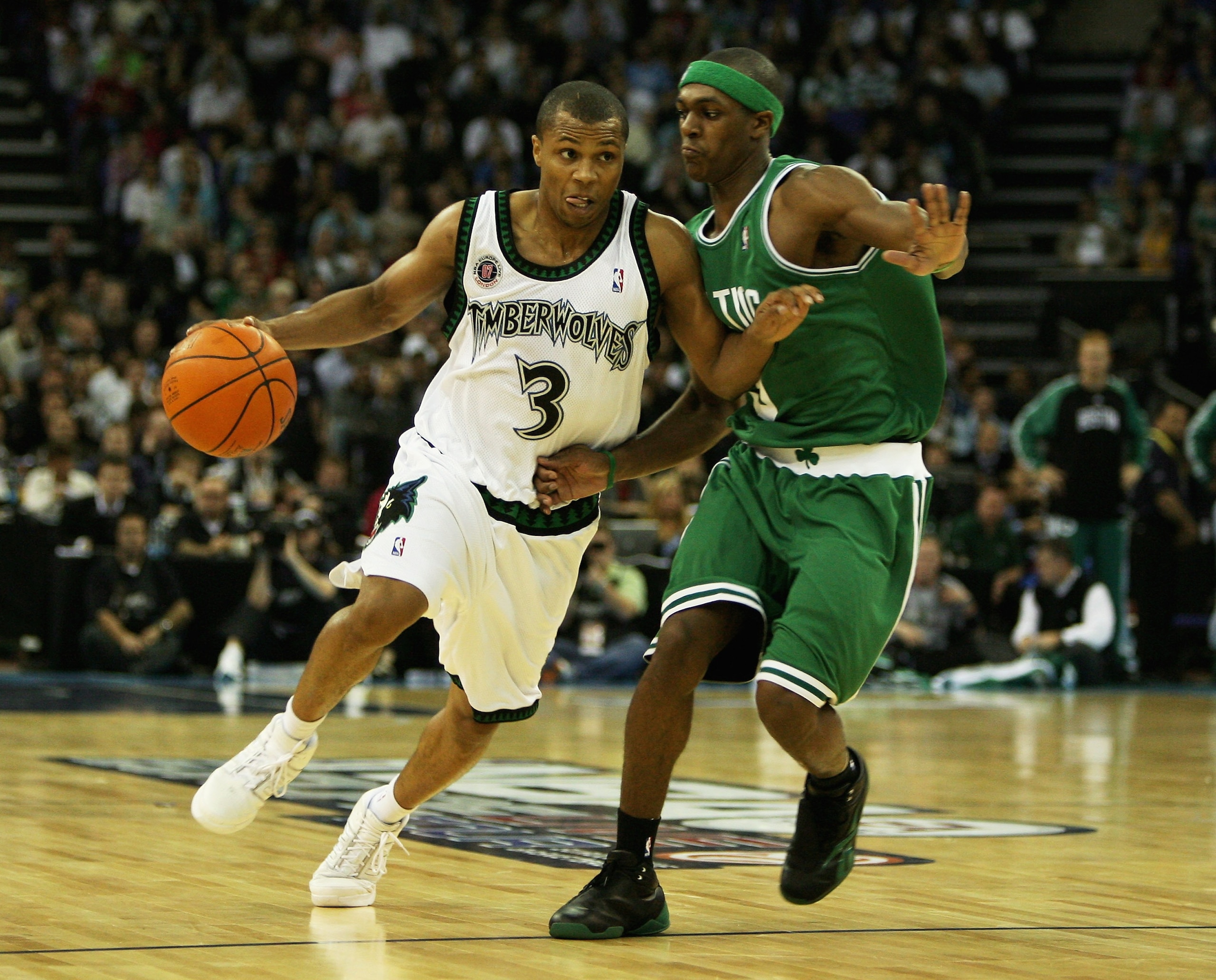 LONDON - OCTOBER 10:  Sebastian Telfair #3 of Minnesota is challenged by Rajon Rondo of Boston during NBA Europe Live 2007 Tour match between the Boston Celtics and the Minnesota Timberwolves at the O2 Arena on October 10, 2007 in London, England.  NOTE T