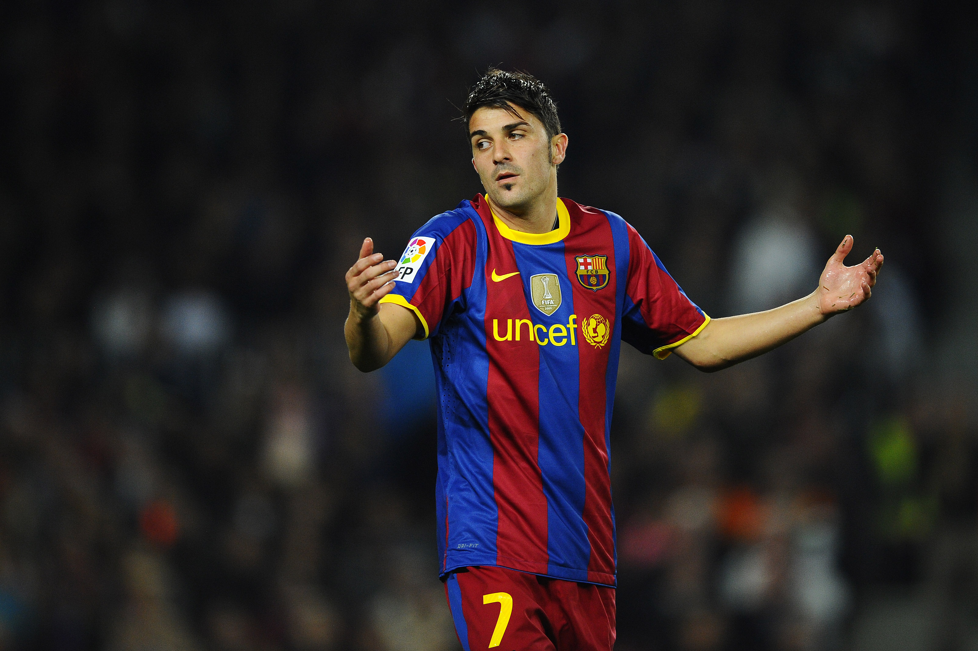 BARCELONA, SPAIN - NOVEMBER 13:  David Villa of FC Barcelona reacts after missing a chance to score during the La Liga match between Barcelona and Villarreal CF at Camp Nou Stadium on November 13, 2010 in Barcelona, Spain. Barcelona won the match 3-1. (Ph