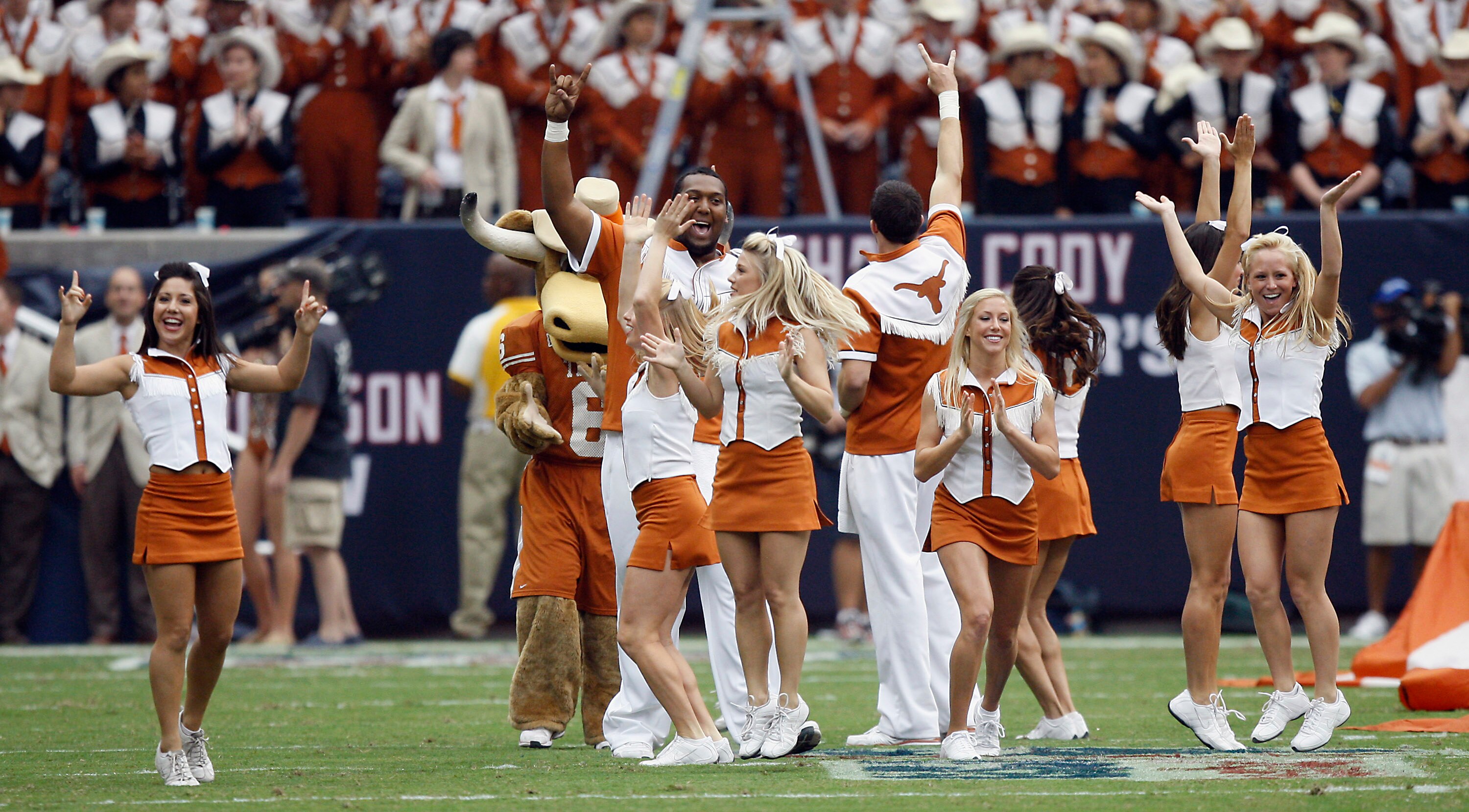 HOUSTON - SEPTEMBER 04:  Texas Longhorns cheerleaders perform at Reliant Stadium on September 4, 2010 in Houston, Texas.  (Photo by Bob Levey/Getty Images)