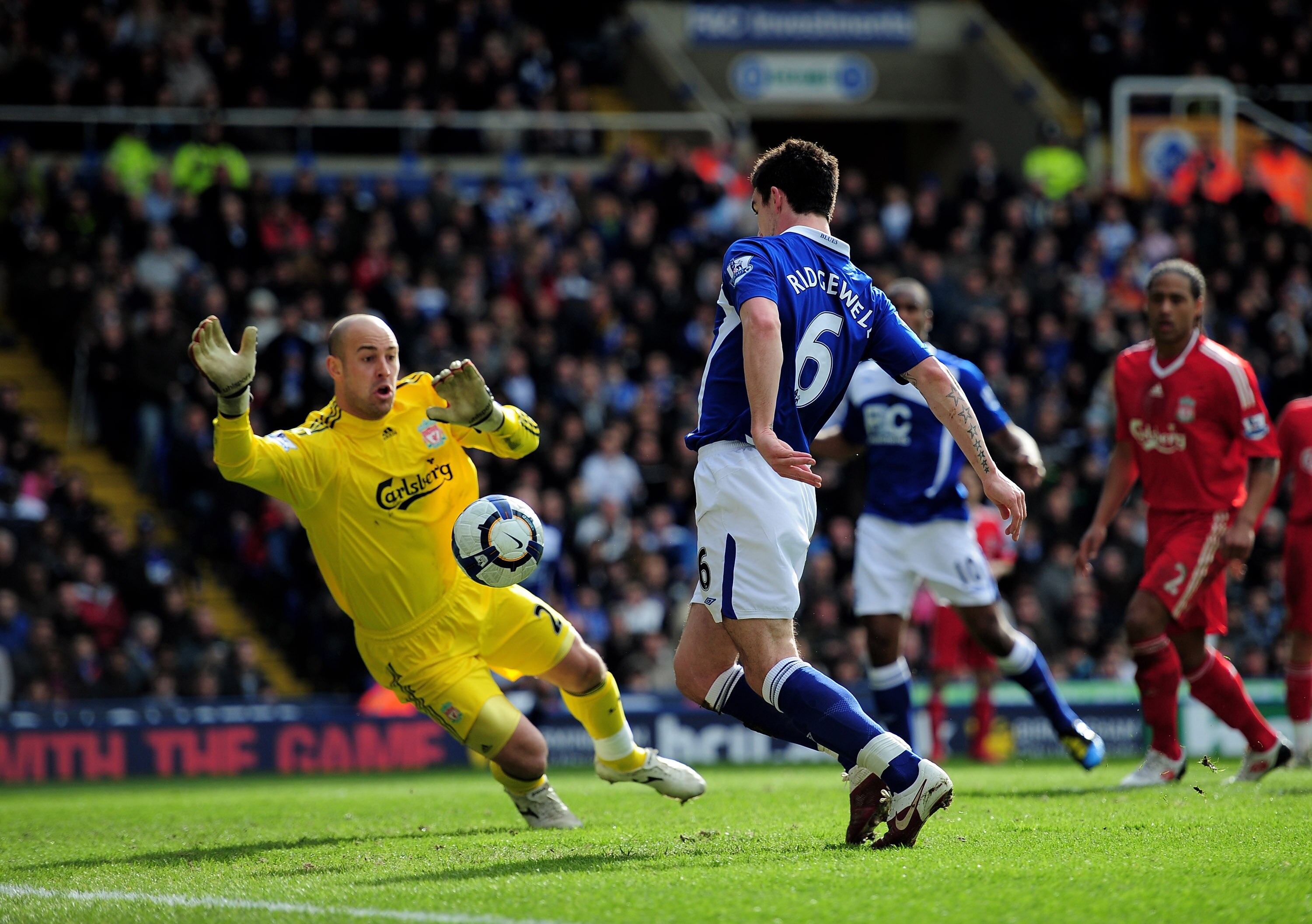 BIRMINGHAM, ENGLAND - APRIL 04:  Liam Ridgewell of Birmingham City scores past Liverpool goalkeeper Pepe Reina during the Barclays Premier League match between Birmingham City and Liverpool at St. Andrews Stadium on April 4, 2010 in Birmingham, England.  
