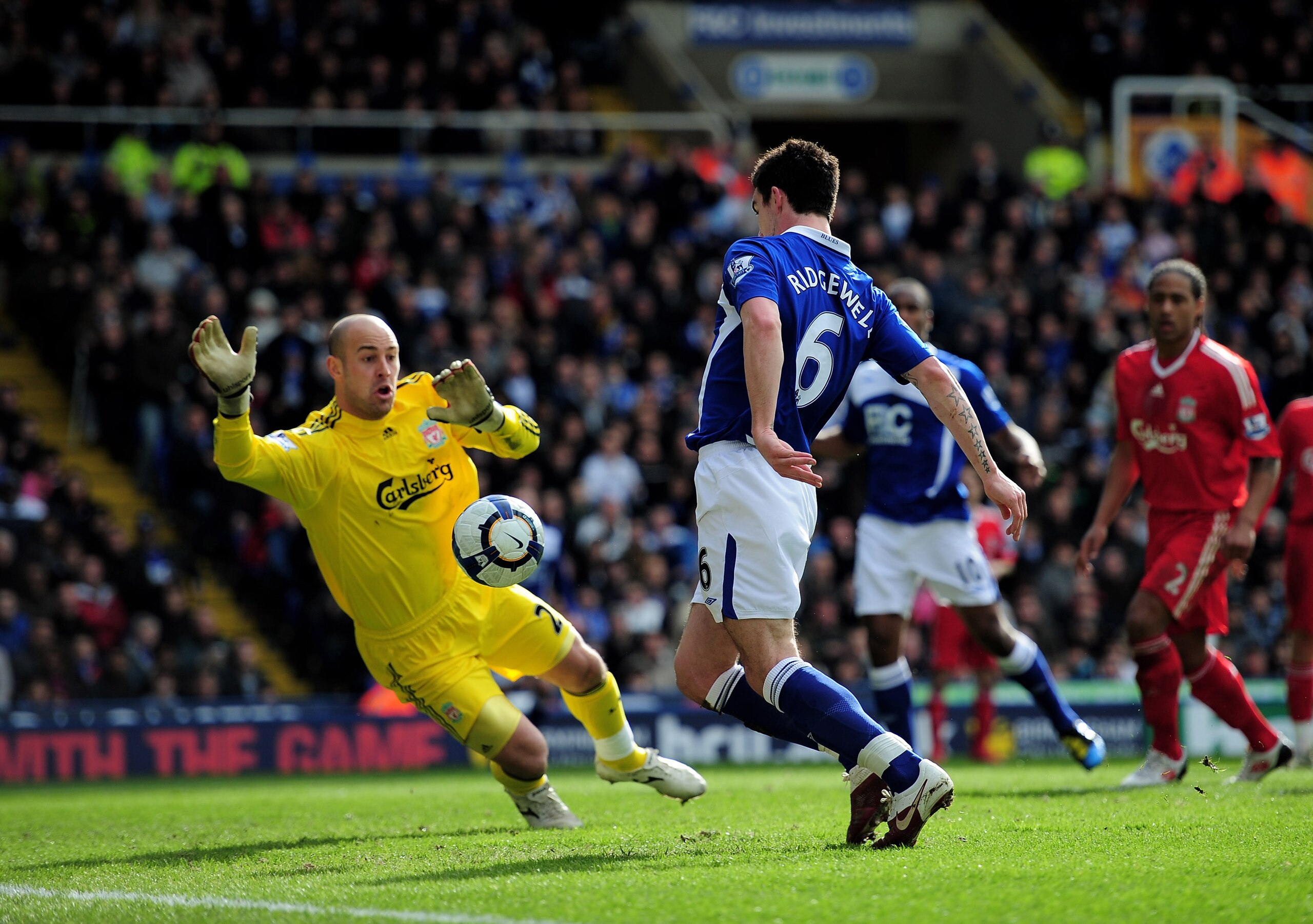 BIRMINGHAM, ENGLAND - APRIL 04:  Liam Ridgewell of Birmingham City scores past Liverpool goalkeeper Pepe Reina during the Barclays Premier League match between Birmingham City and Liverpool at St. Andrews Stadium on April 4, 2010 in Birmingham, England.  