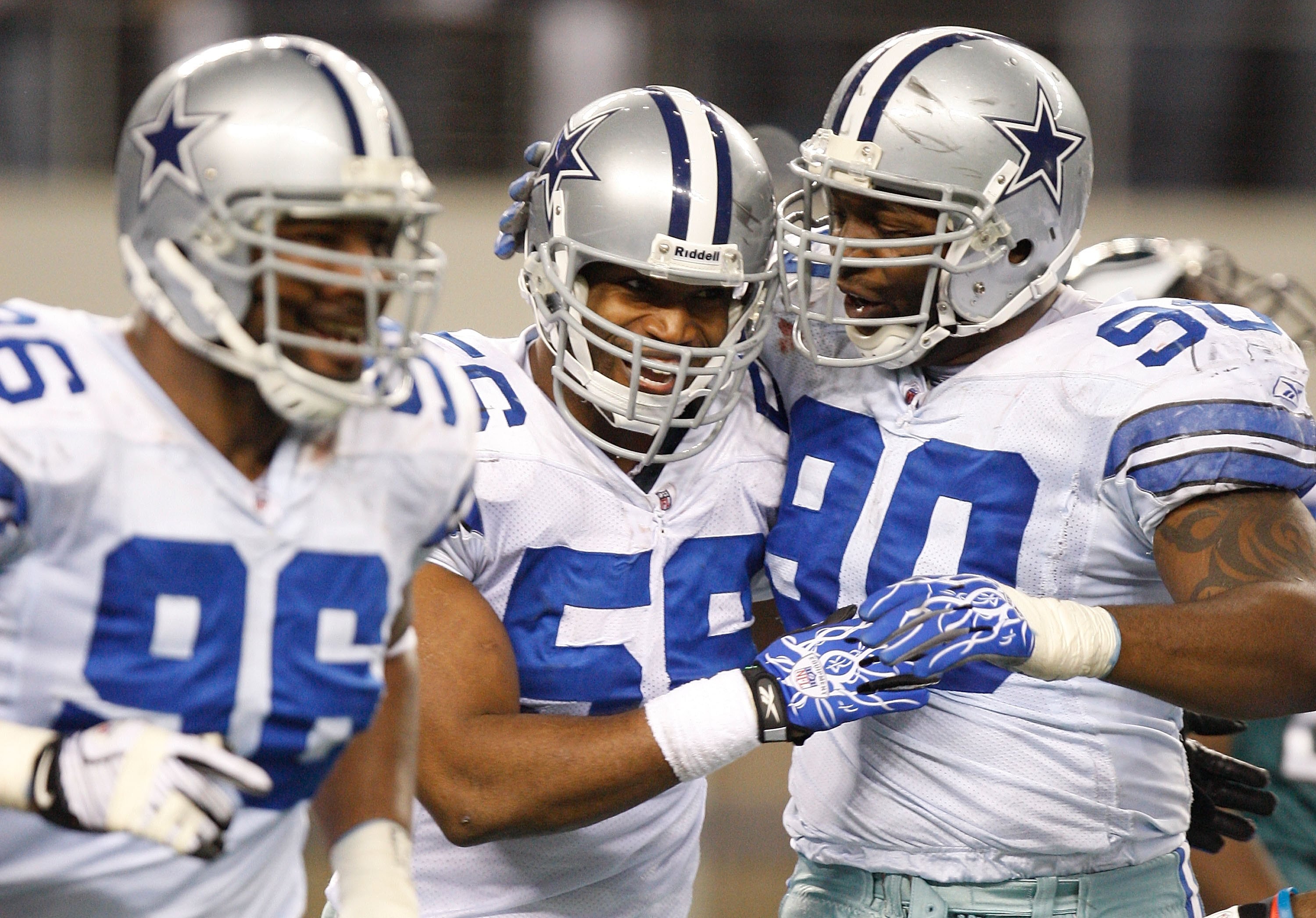 ARLINGTON, TX - JANUARY 9:  Linebacker Bradie James #56 and Jay Ratliff #90 of the Dallas Cowboys during the 2010 NFC wild-card playoff game at Cowboys Stadium on January 9, 2010 in Arlington, Texas. (Photo by Ronald Martinez/Getty Images)
