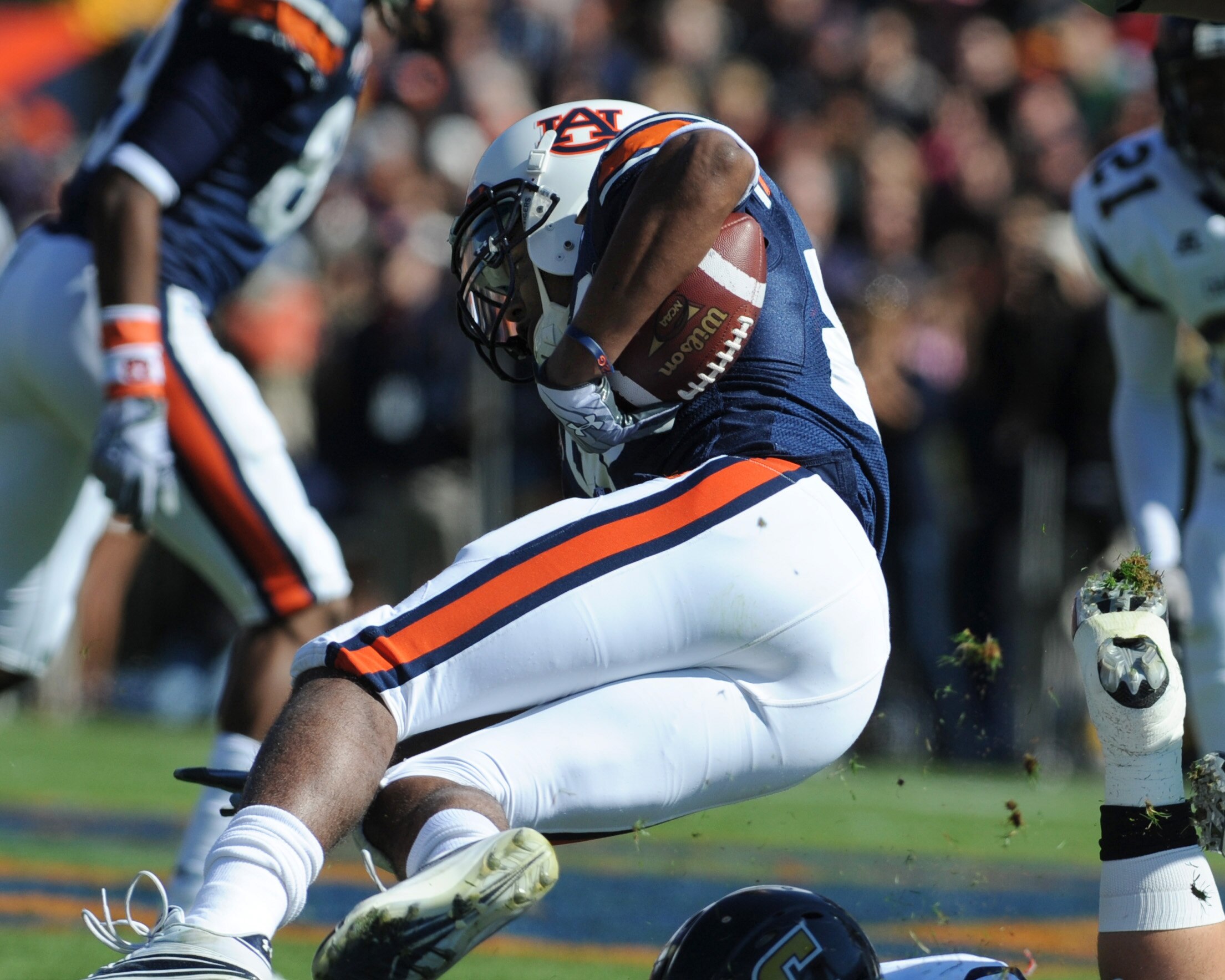 AUBURN, AL - NOVEMBER 06:  Wide receiver Emory Blake #80 of the Auburn Tigers dives for a gain against the Chattanooga Mocs November 6, 2010 at Jordan-Hare Stadium in Auburn, Alabama.  (Photo by Al Messerschmidt/Getty Images)
