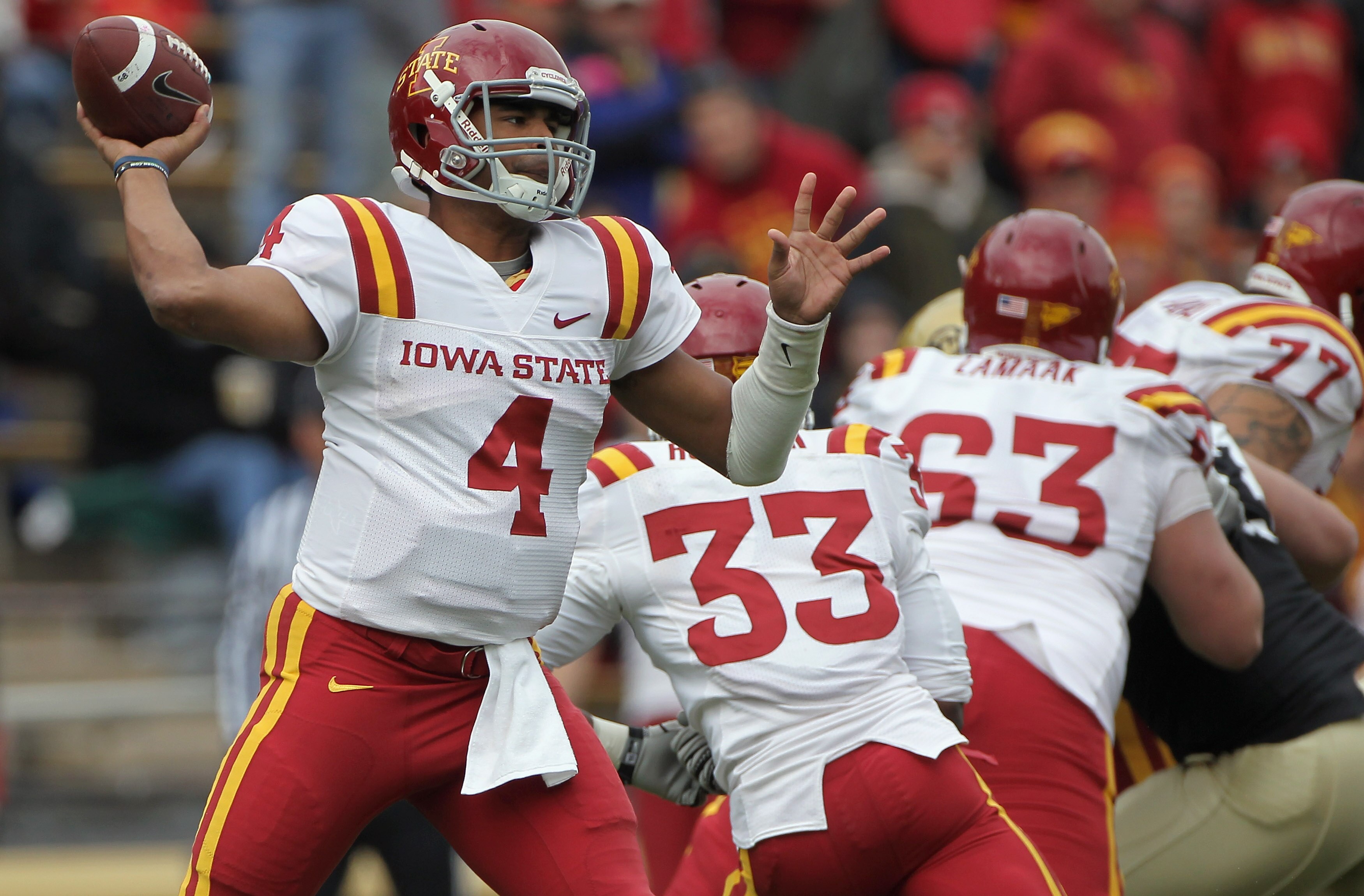 BOULDER, CO - NOVEMBER 13:  Quarterback Austen Arnaud #4 of the Iowa State Cyclones delivers a pass against the Colorado Buffaloes at Folsom Field on November 13, 2010 in Boulder, Colorado. Colorado defeated Iowa State 34-14.  (Photo by Doug Pensinger/Get