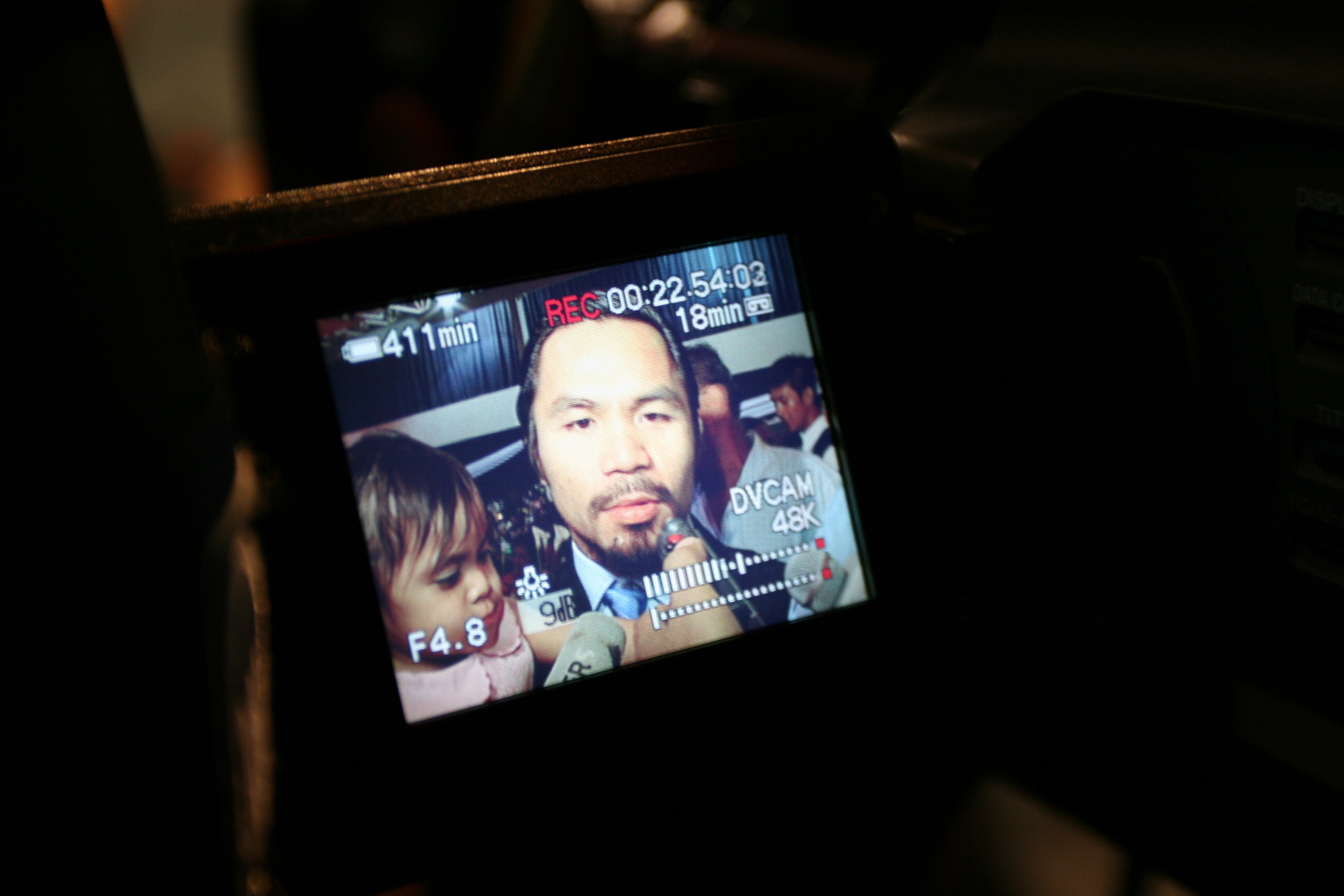 GENERAL SANTOS, PHILIPPINES - MAY 15:  Seen on a camera screen, world welterweight boxing champion Manny Pacquiao arrives at the KCC Mall on May 15, 2010 in General Santos, Philippines. Pacquiao was there to celebrate his election on becoming a member of