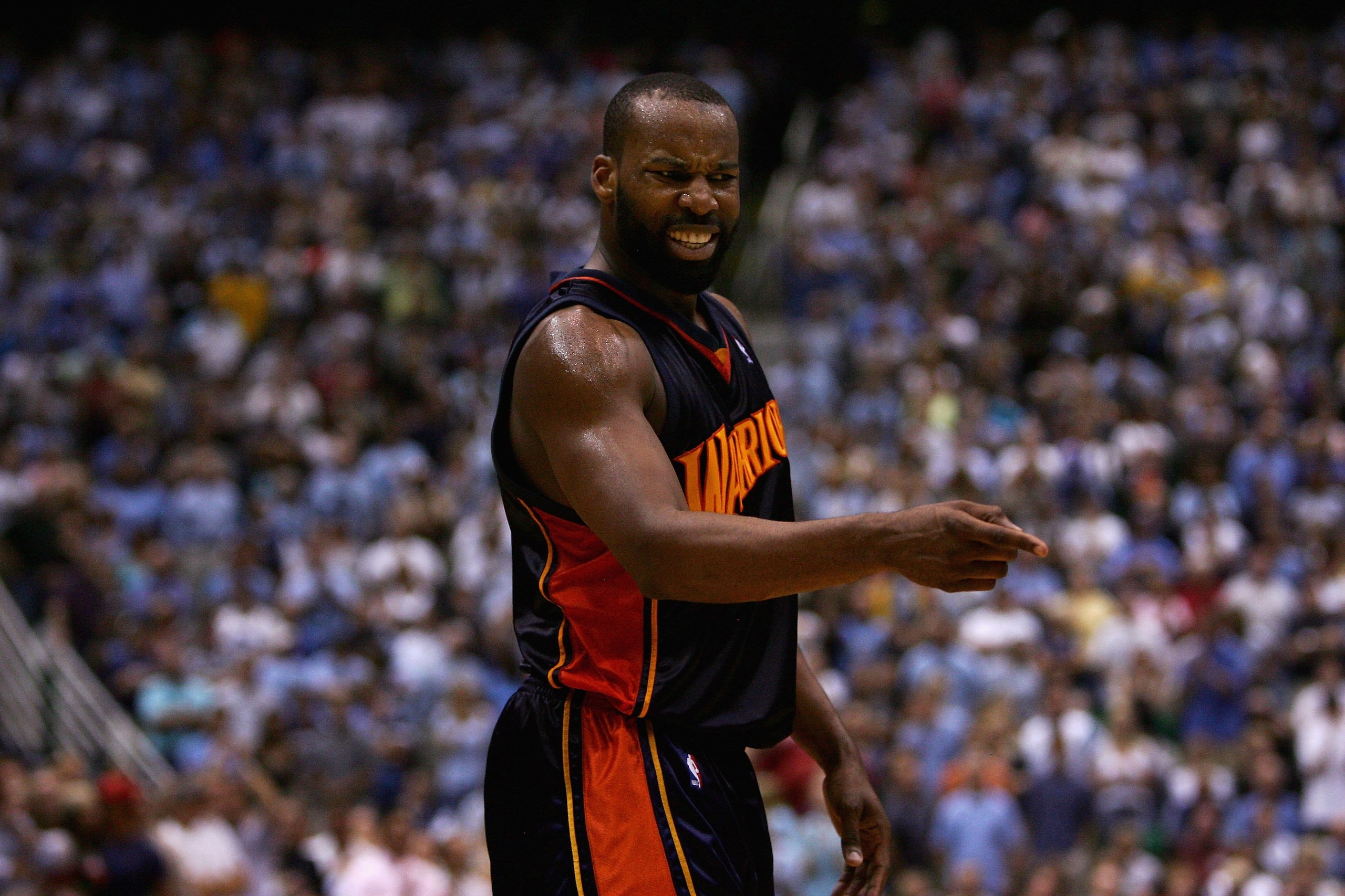 SALT LAKE CITY - MAY 15:  Baron Davis #5 of the Golden State Warriors reacts to a call in Game Five of the Western Conference Semifinals against the Utah Jazz during the 2007 NBA Playoffs at the EnergySolutions Arena on May 15, 2007 in Salt Lake City, Uta