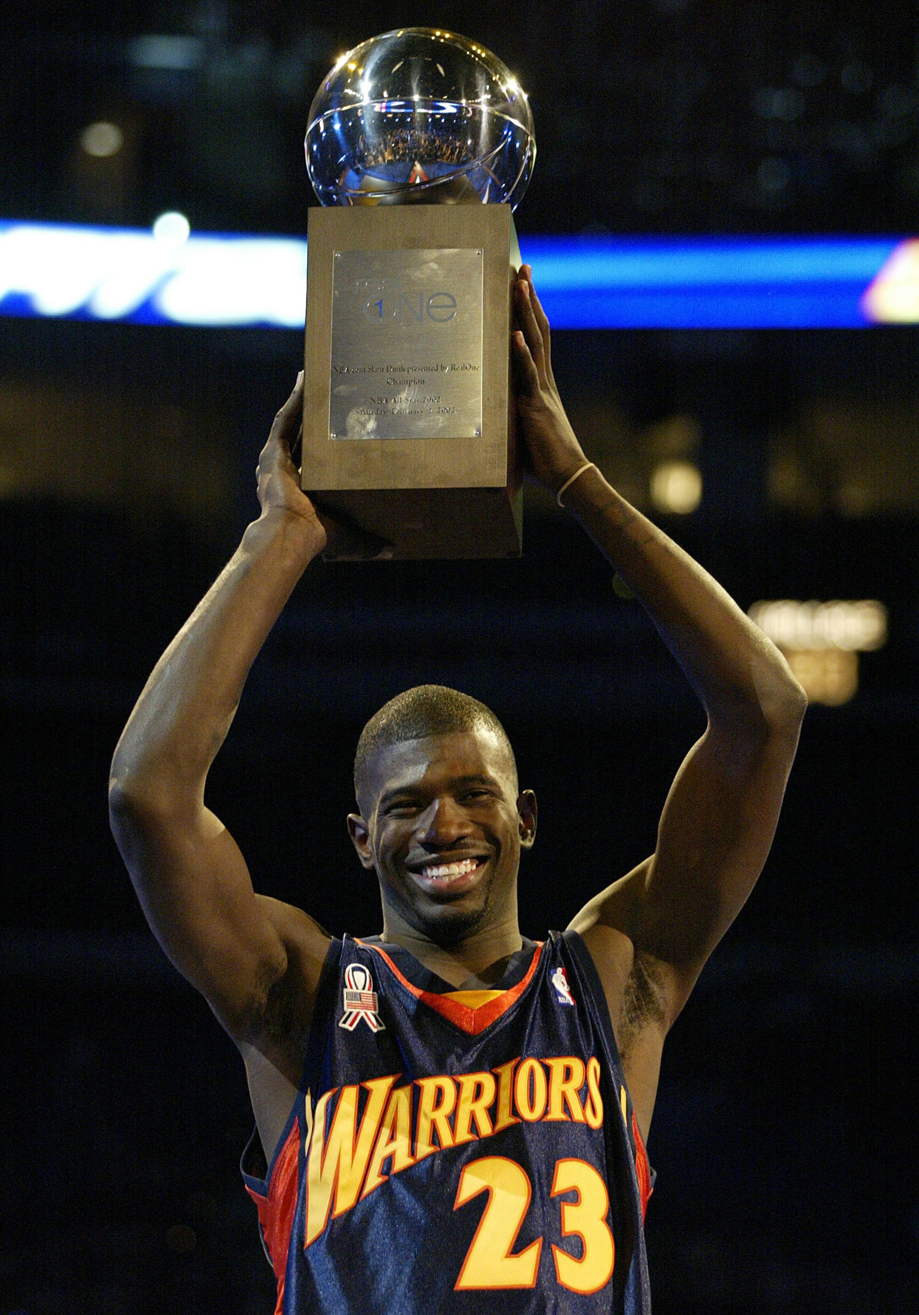 9 Feb 2002: Jason Richardson of the Golden State Warriors holds the winner's trophy after winning the NBA.Com Slam Dunk competition during the NBA All-Star Weekend at the First Union Center in Philadelphia, Pennsylvania. Richardson won the event and the 9 Feb 2002: Jason Richardson of the Golden State Warriors holds the winner's trophy after winning the NBA.Com Slam Dunk competition during the NBA All-Star Weekend at the First Union Center in Philadelphia, Pennsylvania. Richardson won the event and the