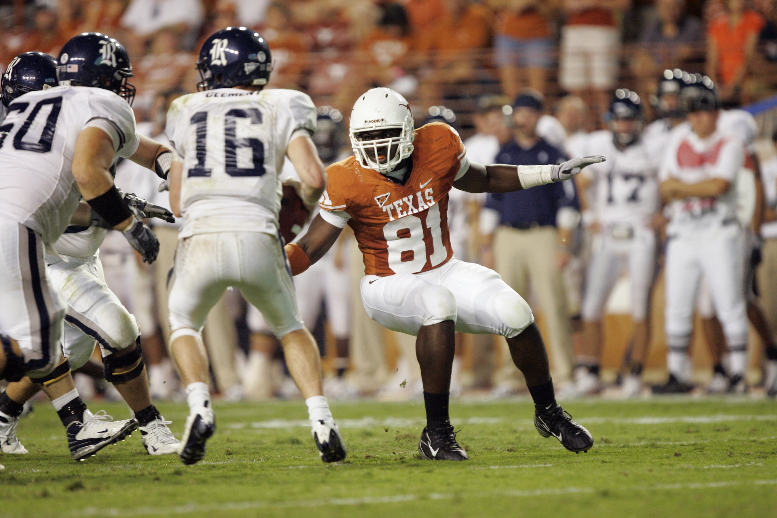AUSTIN, TX - SEPTEMBER 20:  Sam Acho #81 of the Texas Longhorns pressures Chase Clement #16 of the Rice Owls during the game on September 20, 2008 at Darrell K Royal-Texas Memorial Stadium in Austin, Texas. Texas won 52-10. (Photo by Brian Bahr/Getty Imag