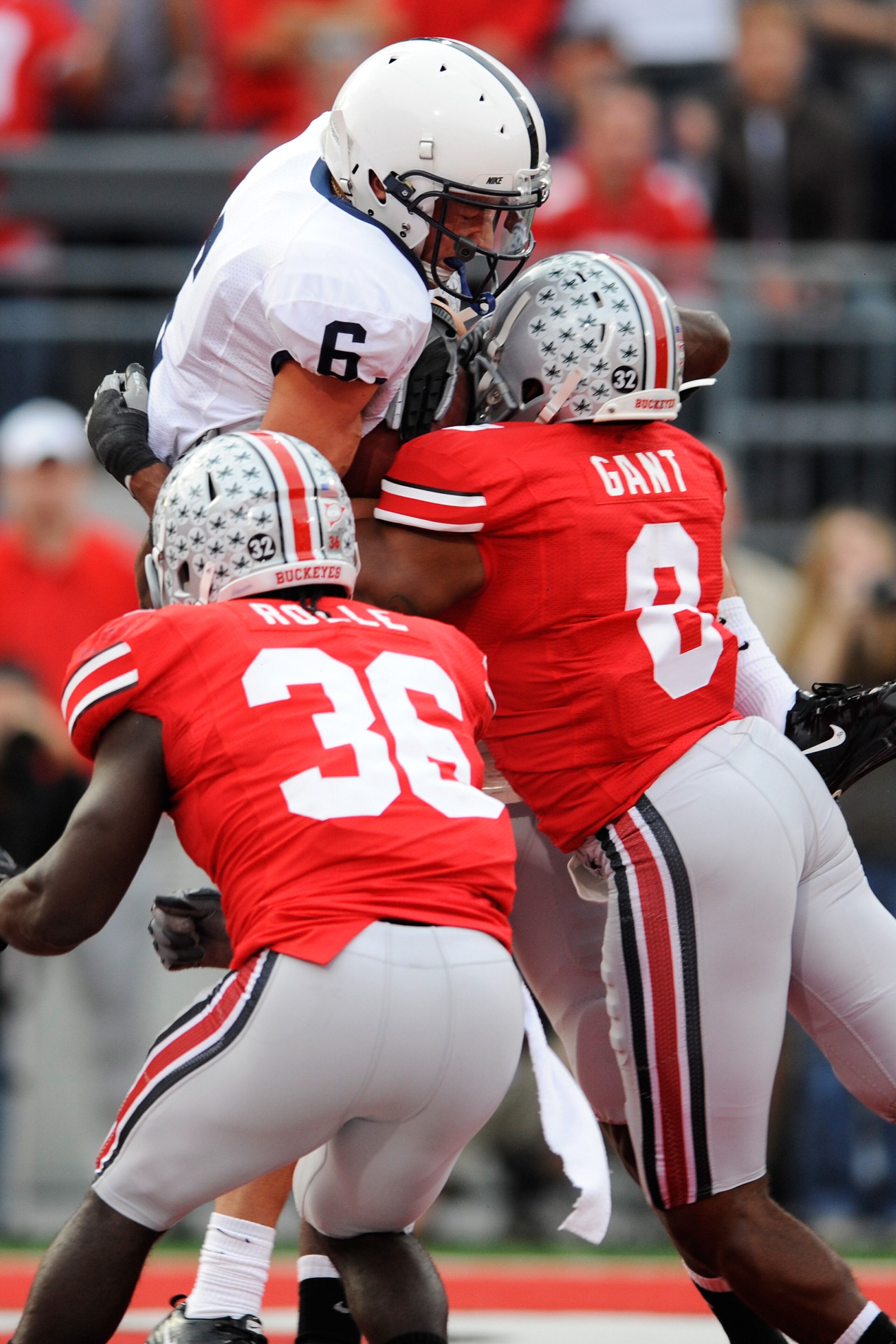 COLUMBUS, OH - NOVEMBER 13:  Derek Moye #6 of the Penn State Nittany Lions makes six-yard touchdown reception in the first half as Brian Rolle #36 of the Ohio State Buckeyes and Aaron Gant #8 of the Ohio State Buckeyes defend at Ohio Stadium on November 1