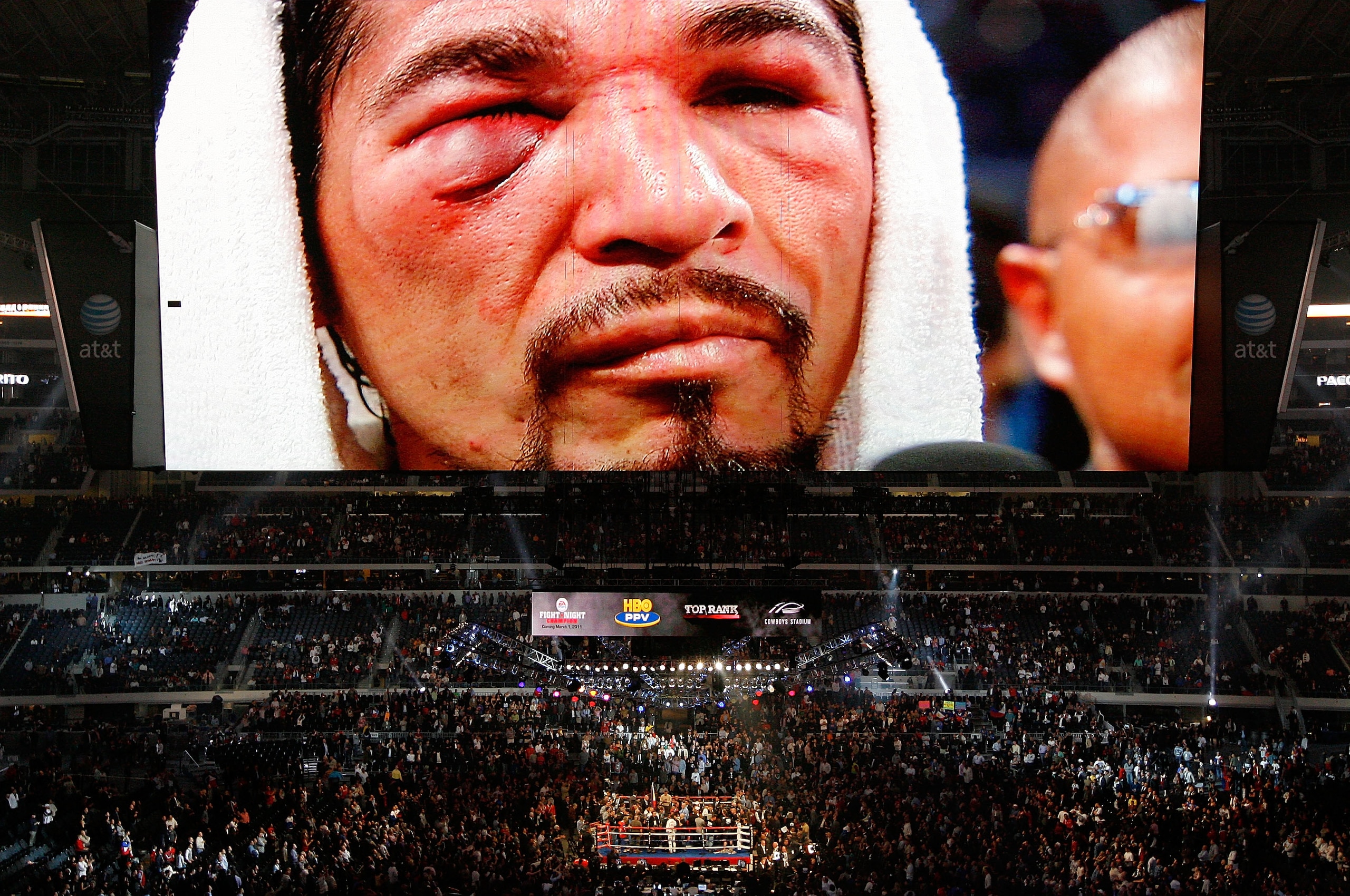 ARLINGTON, TX - NOVEMBER 13: The likeness of Antonio Margarito (black trunks) of Mexico is seen on the giant screen as he is interviewed after he lost to Manny Pacquiao (white trunks) of the Philippines during their WBC World Super Welterweight Title bou ARLINGTON, TX - NOVEMBER 13: The likeness of Antonio Margarito (black trunks) of Mexico is seen on the giant screen as he is interviewed after he lost to Manny Pacquiao (white trunks) of the Philippines during their WBC World Super Welterweight Title bou