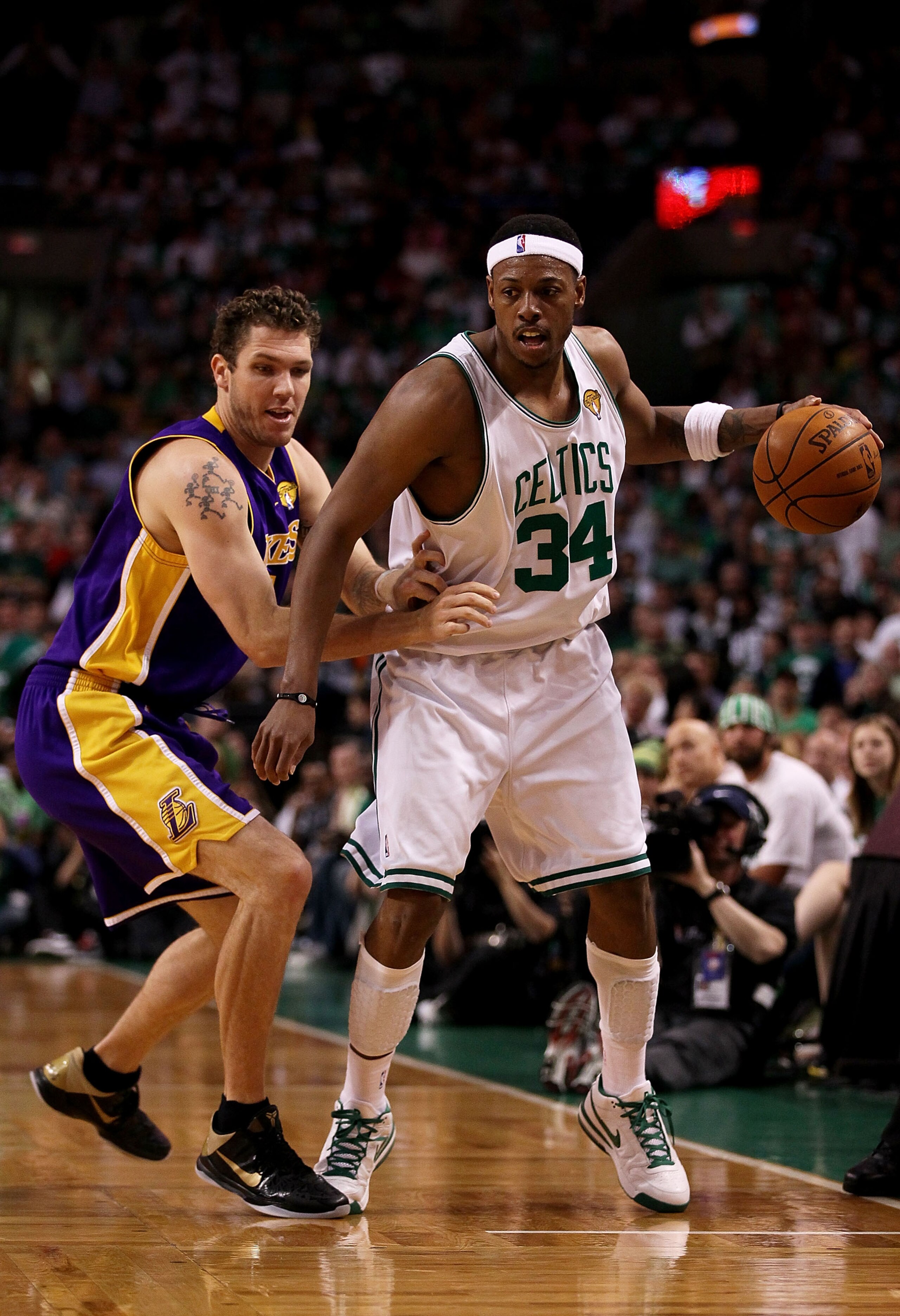 BOSTON - JUNE 13: Paul Pierce #34 of the Boston Celtics handles the ball against Luke Walton #4 of the Los Angeles Lakers in the second quarter during Game Five of the 2010 NBA Finals on June 13, 2010 at TD Garden in Boston, Massachusetts. NOTE TO USER: BOSTON - JUNE 13: Paul Pierce #34 of the Boston Celtics handles the ball against Luke Walton #4 of the Los Angeles Lakers in the second quarter during Game Five of the 2010 NBA Finals on June 13, 2010 at TD Garden in Boston, Massachusetts. NOTE TO USER: