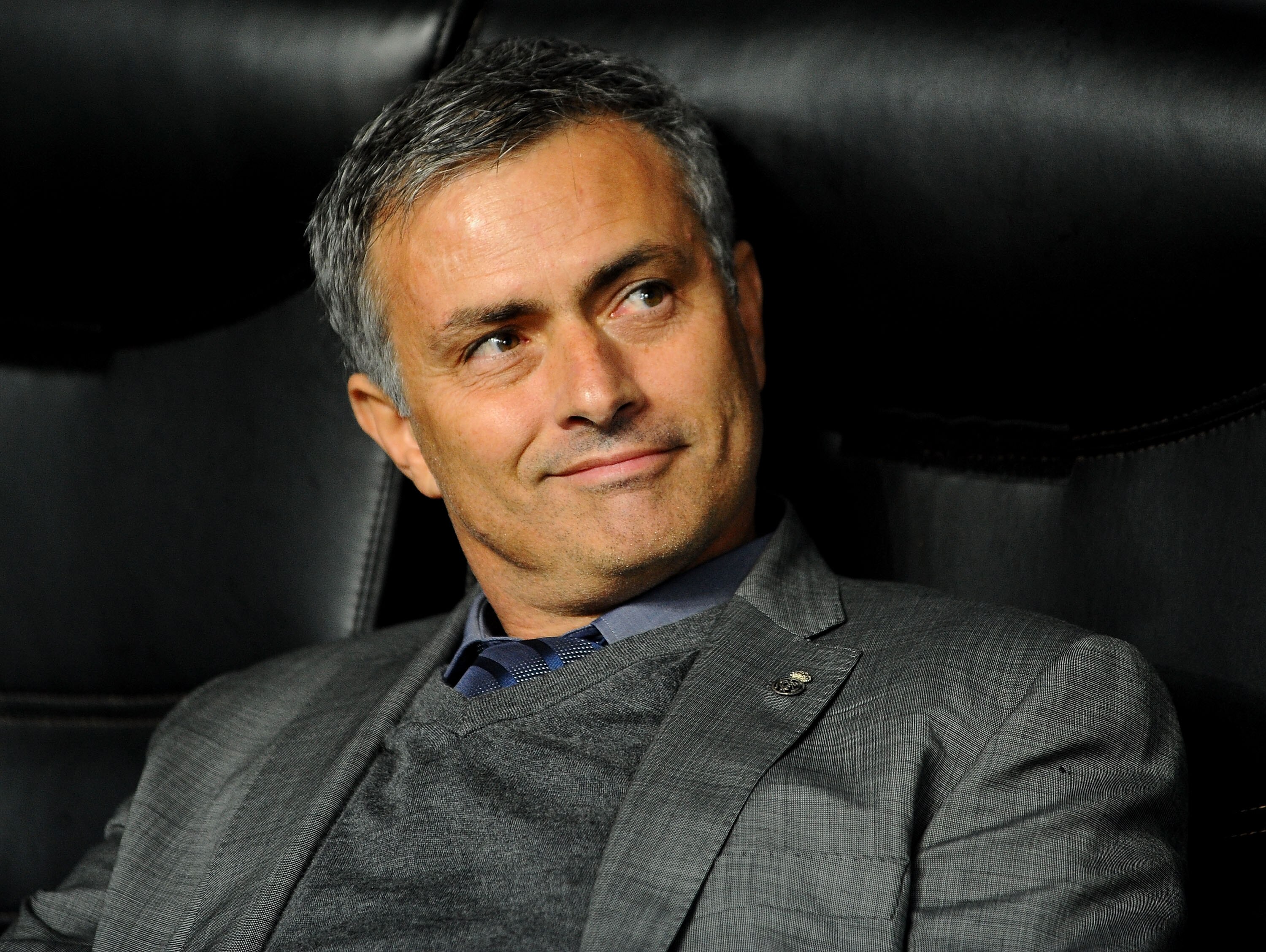 MILAN, ITALY - NOVEMBER 03: Head coach Jose Mourinho of Real Madrid smiles during the Uefa Champions League group G match between AC Milan and Real Madrid at Stadio Giuseppe Meazza on November 3, 2010 in Milan, Italy.  (Photo by Massimo Cebrelli/Getty Ima