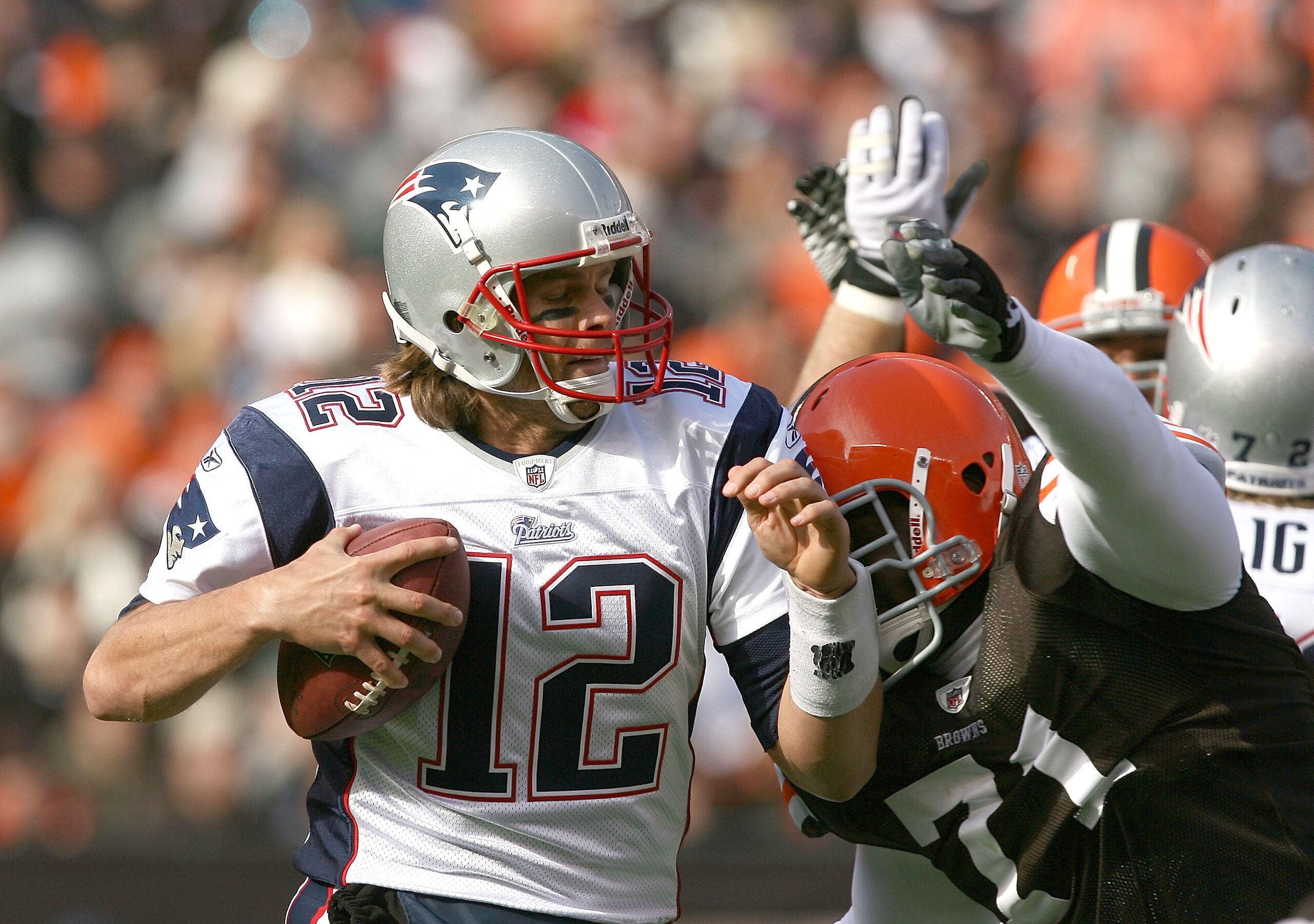 CLEVELAND - NOVEMBER 07:  Quarterback Tom Brady #12 of the New England Patriots is sacked by defensive lineman Ahtyba Rubin #71 of the Cleveland Browns at Cleveland Browns Stadium on November 7, 2010 in Cleveland, Ohio.  (Photo by Matt Sullivan/Getty Imag